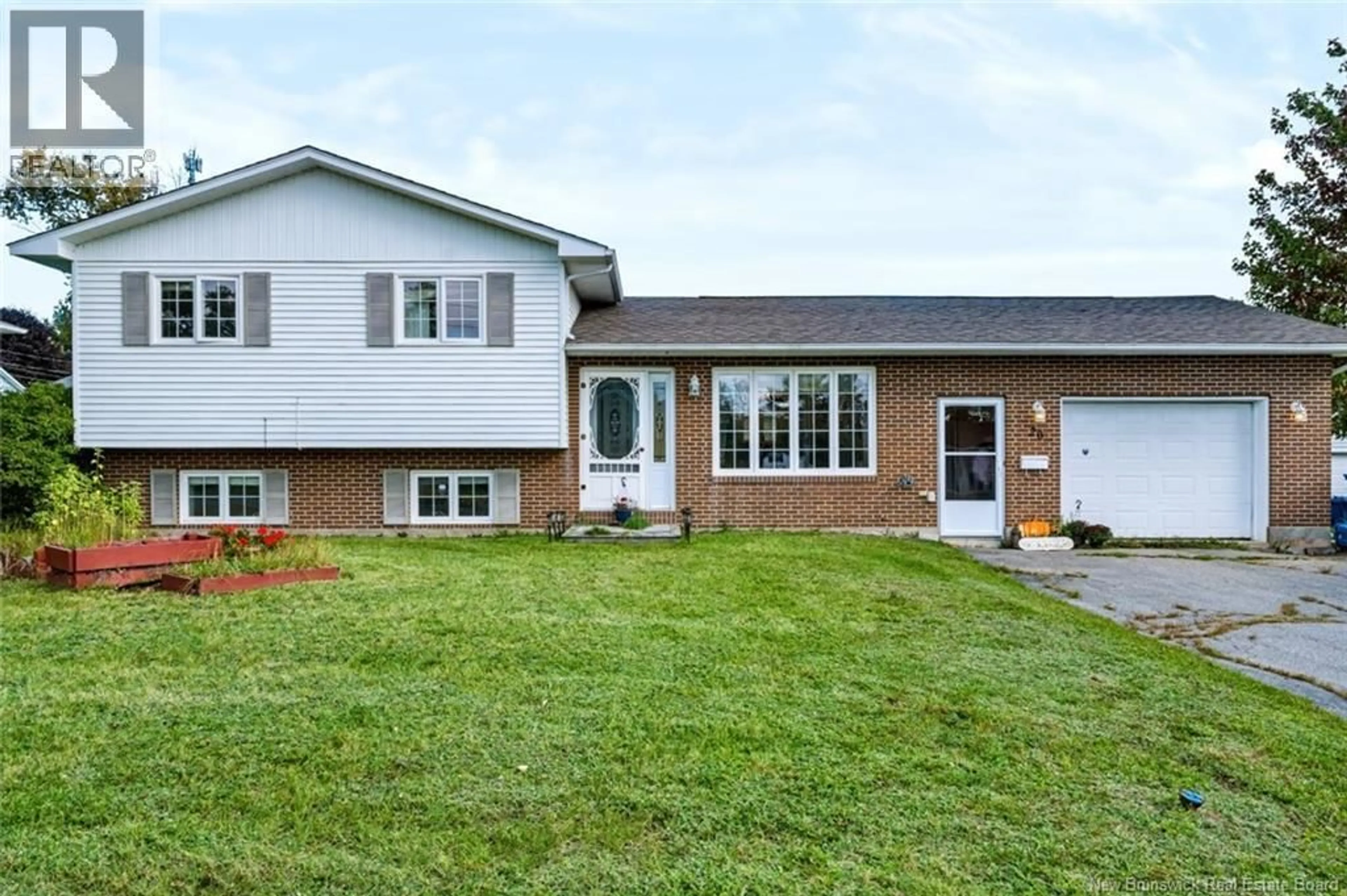 Home with vinyl exterior material, street for 20 LOCKE STREET, Miramichi New Brunswick E1V3X7