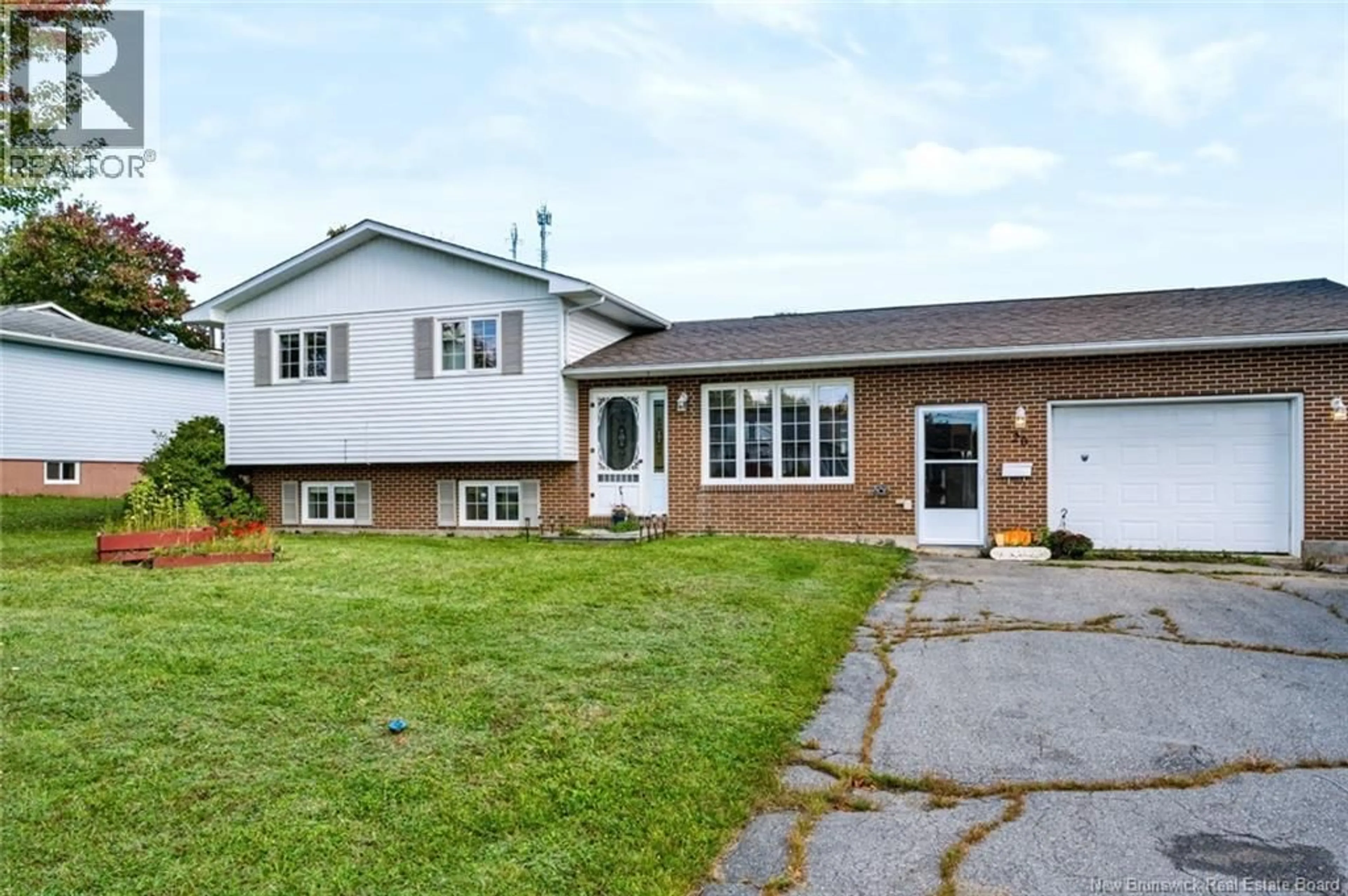 Home with vinyl exterior material, street for 20 LOCKE STREET, Miramichi New Brunswick E1V3X7