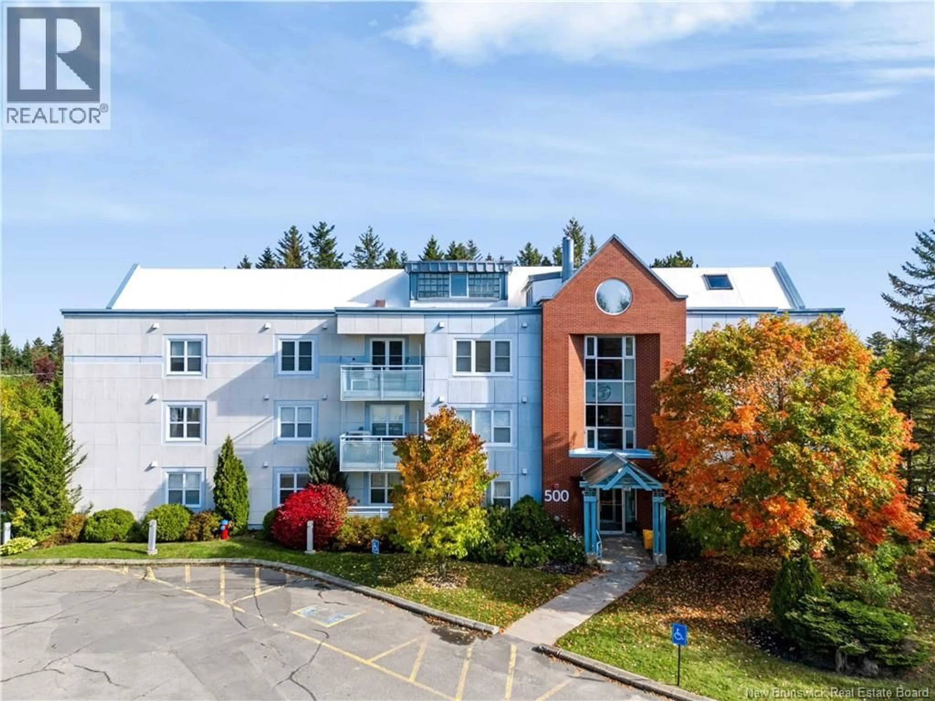 A pic from outside/outdoor area/front of a property/back of a property/a pic from drone, building for 130 - 500 VENUS COURT, Fredericton New Brunswick E3B3A9