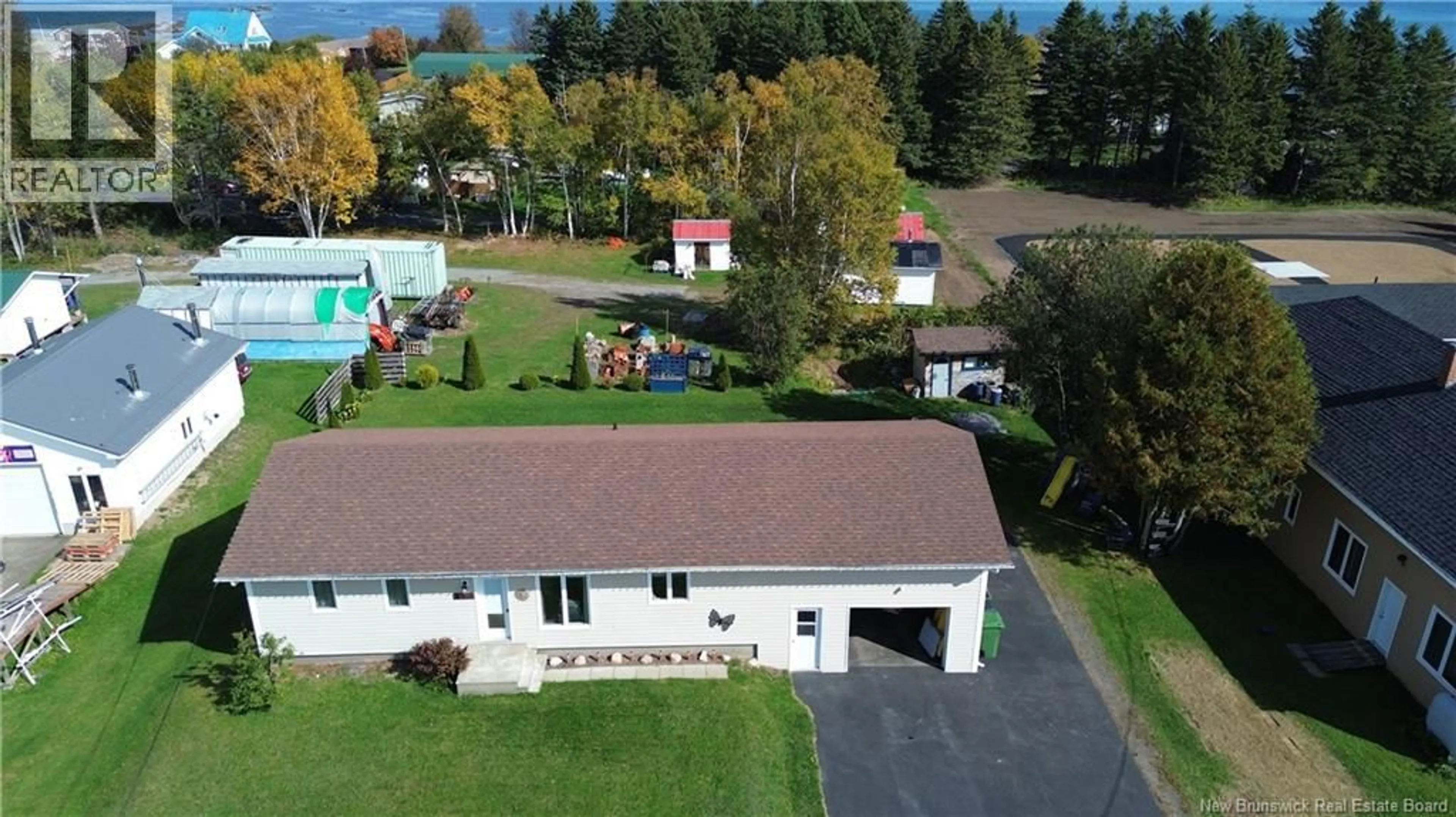A pic from outside/outdoor area/front of a property/back of a property/a pic from drone, unknown for 321 ROUTE 134, Petit-Rocher-Nord New Brunswick E8J2E2
