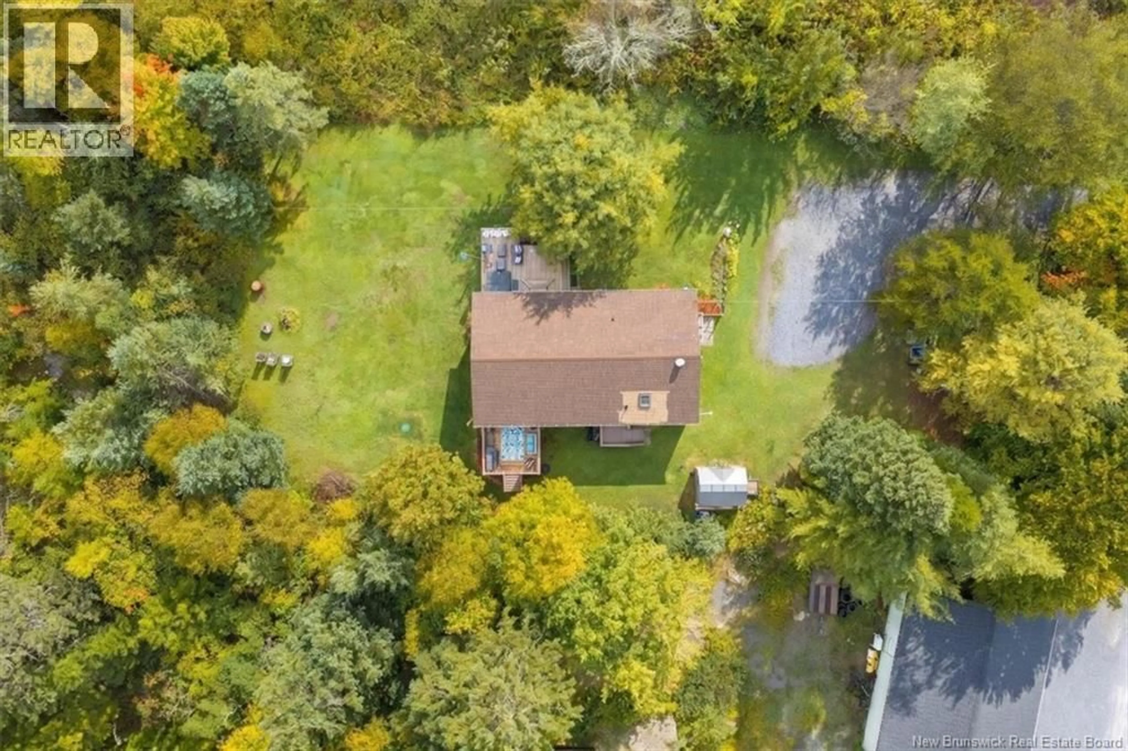A pic from outside/outdoor area/front of a property/back of a property/a pic from drone, forest/trees view for 130 HILLCREST ROAD, Saint John New Brunswick E2N1T3