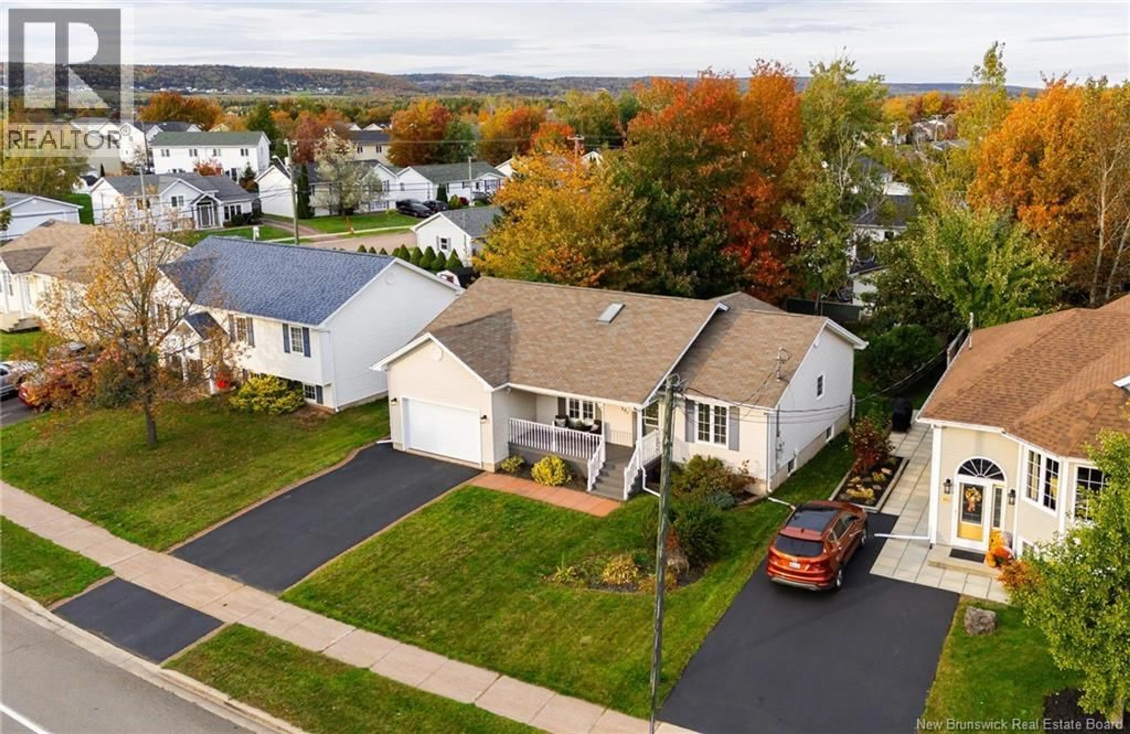 A pic from outside/outdoor area/front of a property/back of a property/a pic from drone, street for 321 TWIN OAKS DRIVE, Moncton New Brunswick E1G4W7