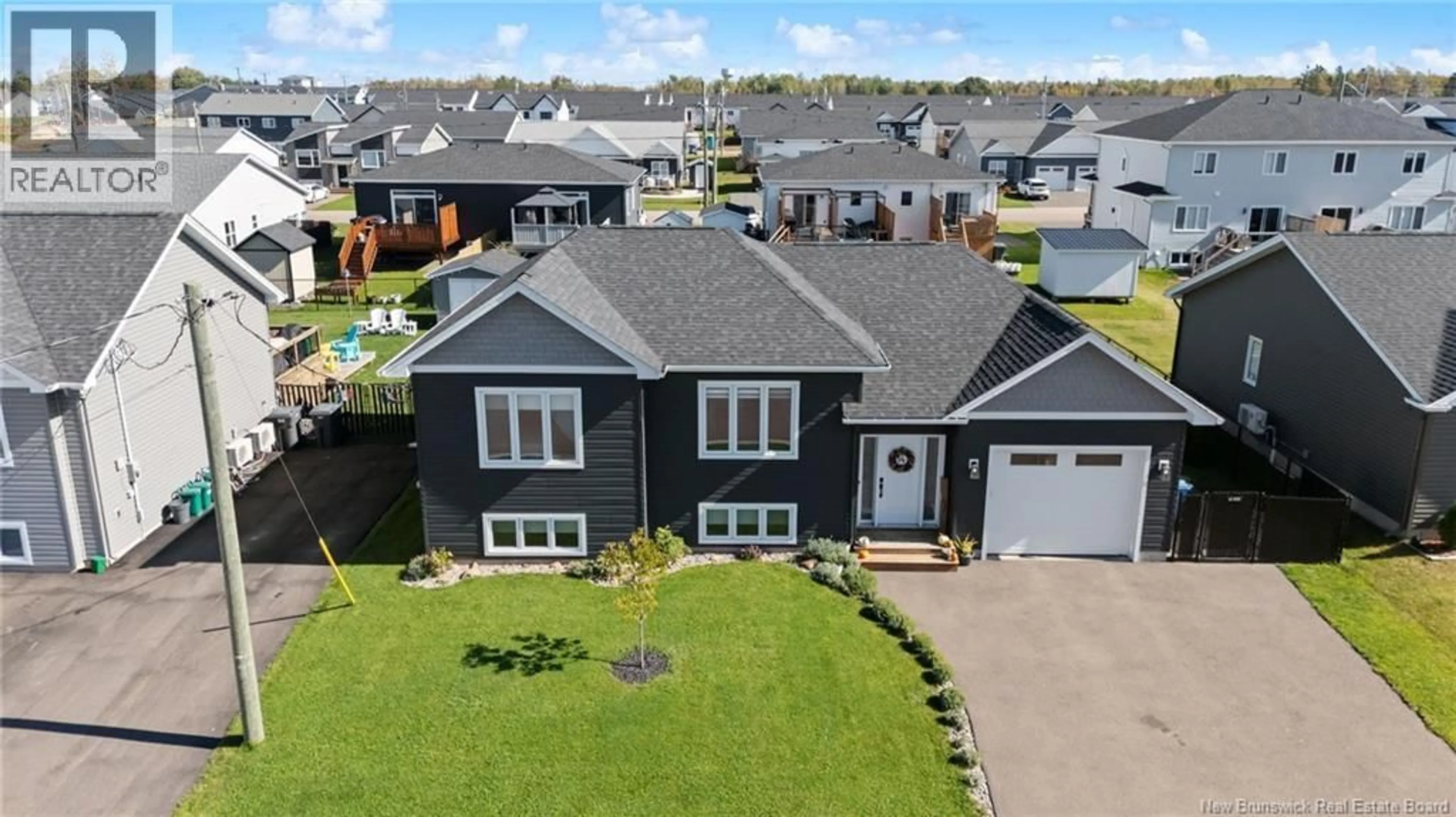 A pic from outside/outdoor area/front of a property/back of a property/a pic from drone, street for 14 ROBERT STREET, Shediac New Brunswick E4P0R2