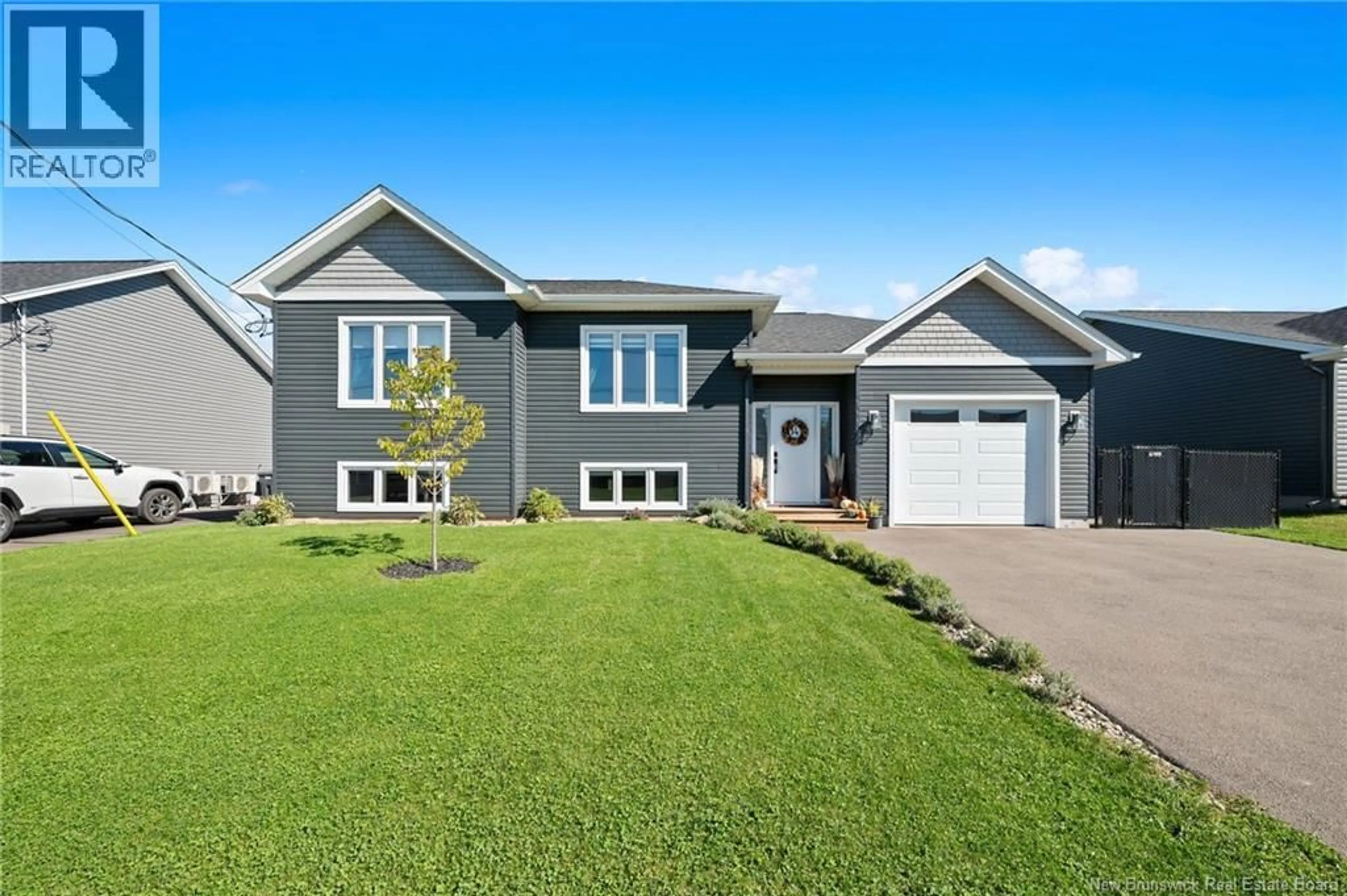 Home with vinyl exterior material, street for 14 ROBERT STREET, Shediac New Brunswick E4P0R2
