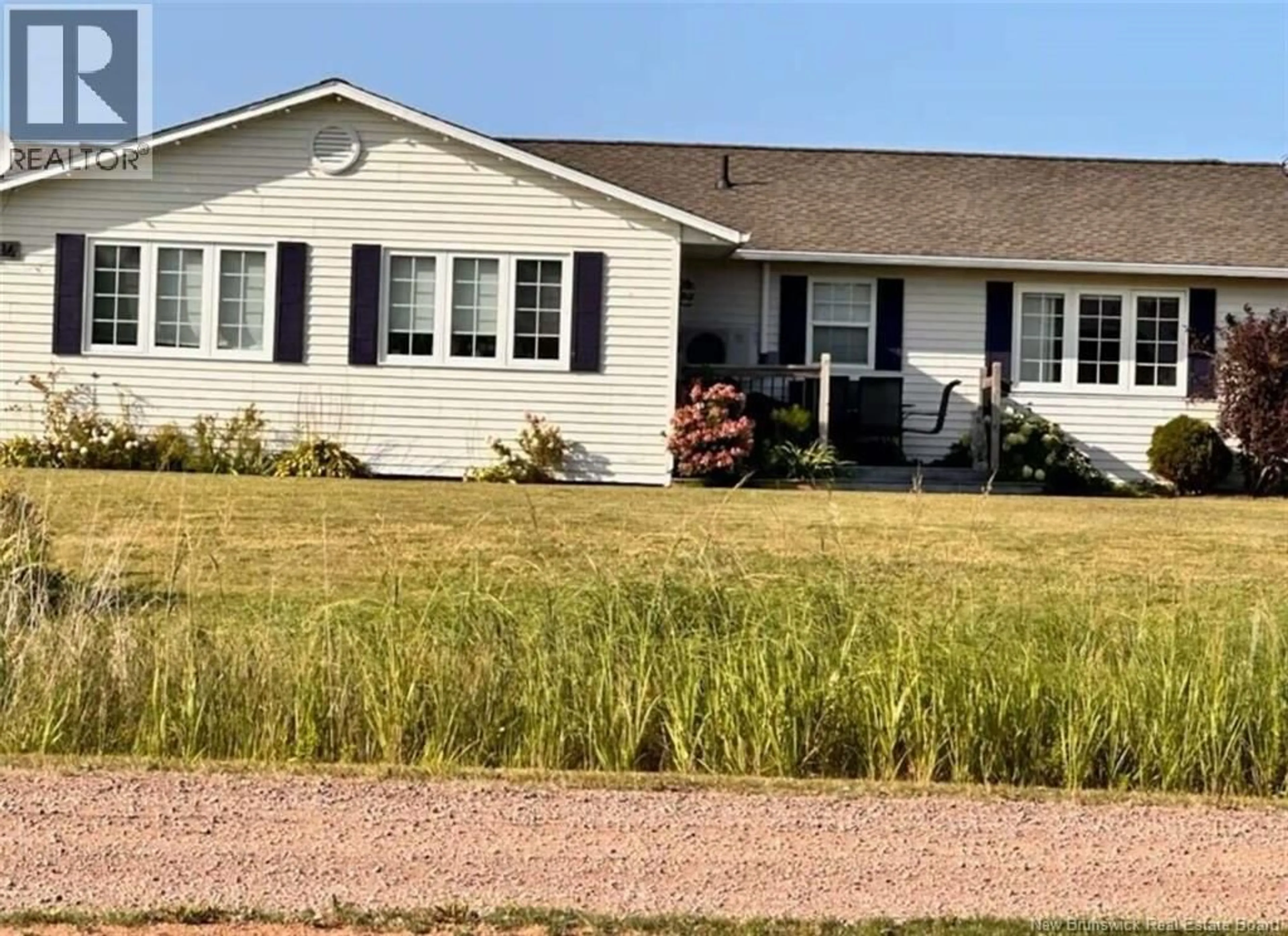 Home with vinyl exterior material, street for 16 SPENCE'S BEACH ROAD, Murray Corner New Brunswick E4M3R5