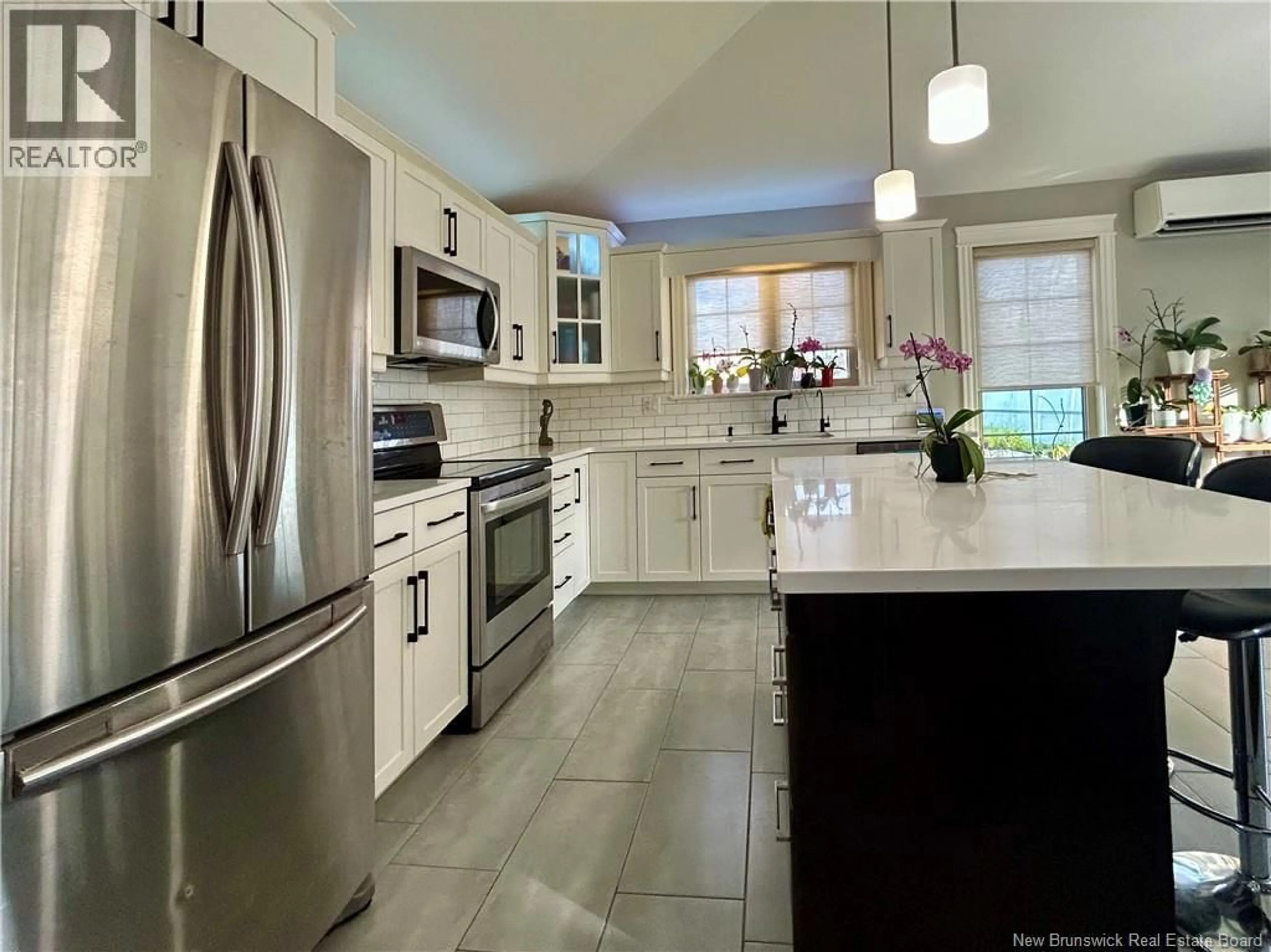 Open concept kitchen, ceramic/tile floor for 37 GUY STREET, Shediac New Brunswick E4P0L5