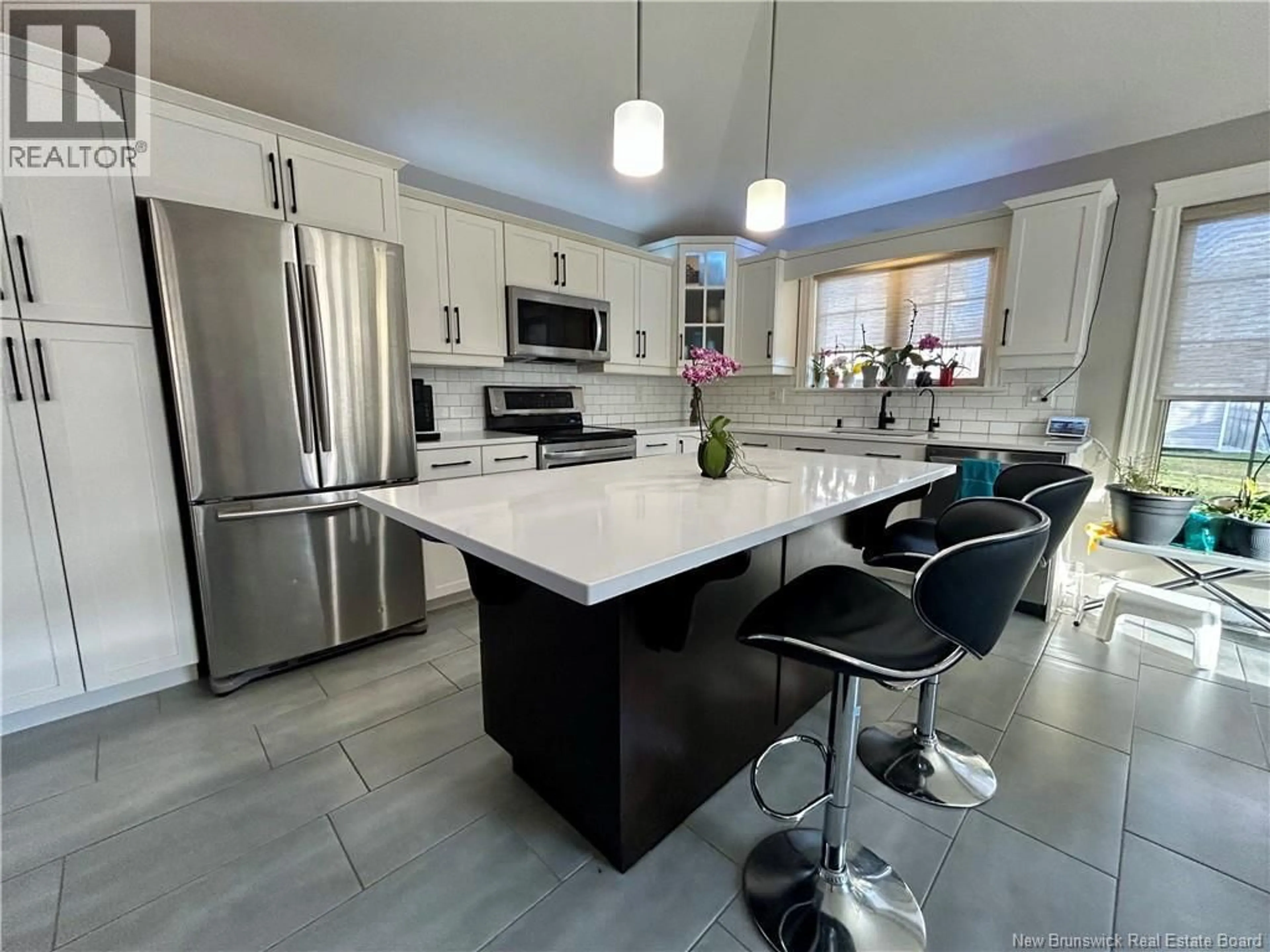 Open concept kitchen, ceramic/tile floor for 37 GUY STREET, Shediac New Brunswick E4P0L5