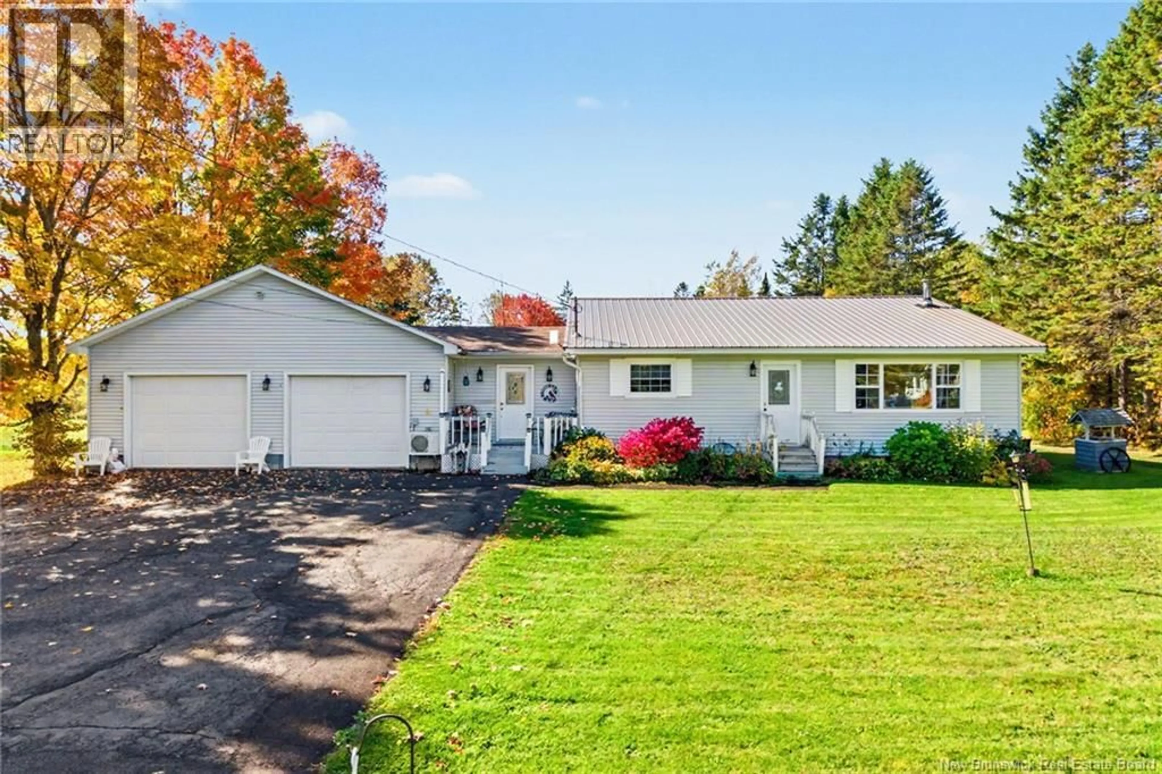Home with vinyl exterior material, street for 4015 ROUTE 104, Millville New Brunswick E6E1S6