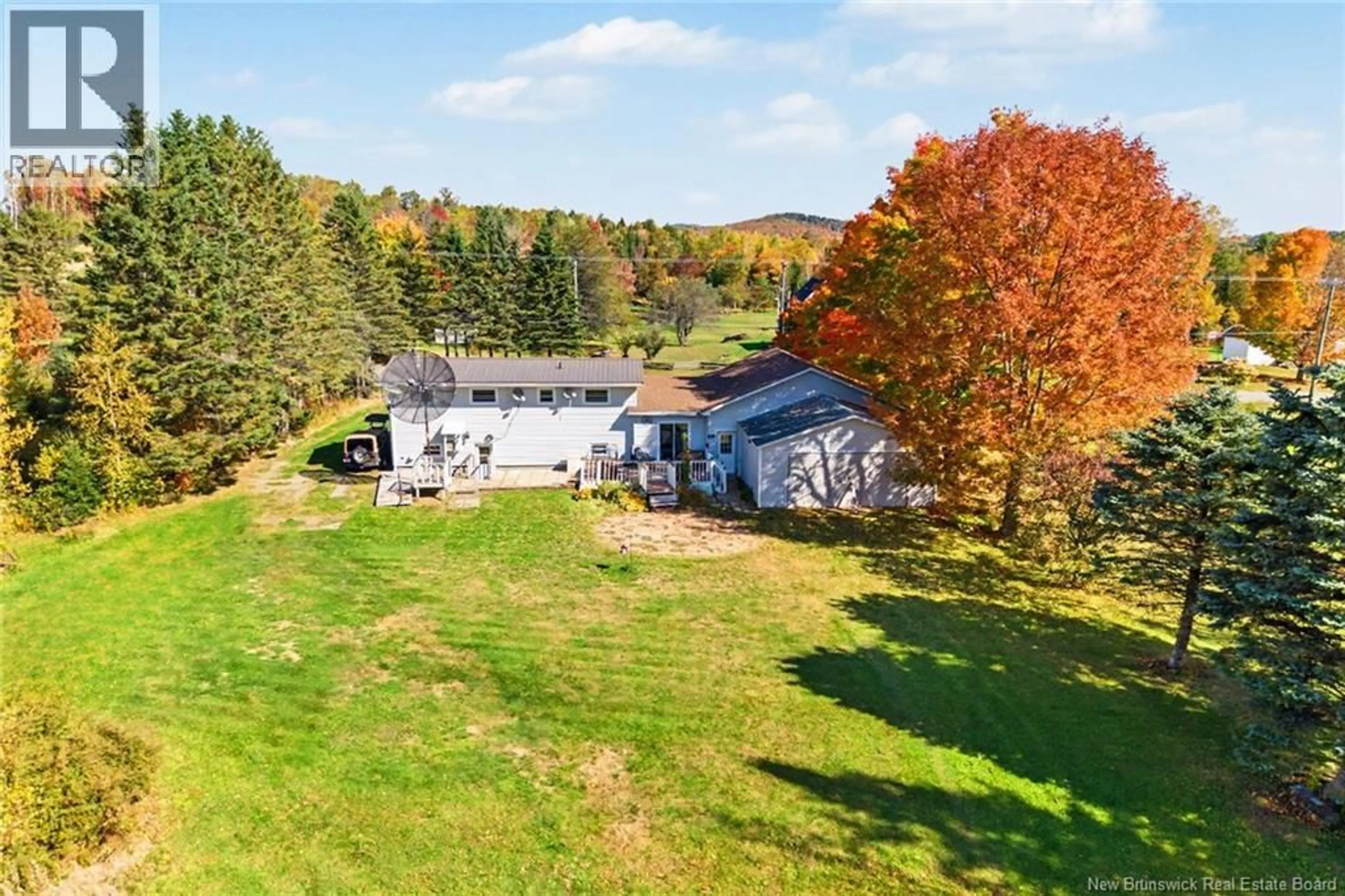 A pic from outside/outdoor area/front of a property/back of a property/a pic from drone, unknown for 4015 ROUTE 104, Millville New Brunswick E6E1S6