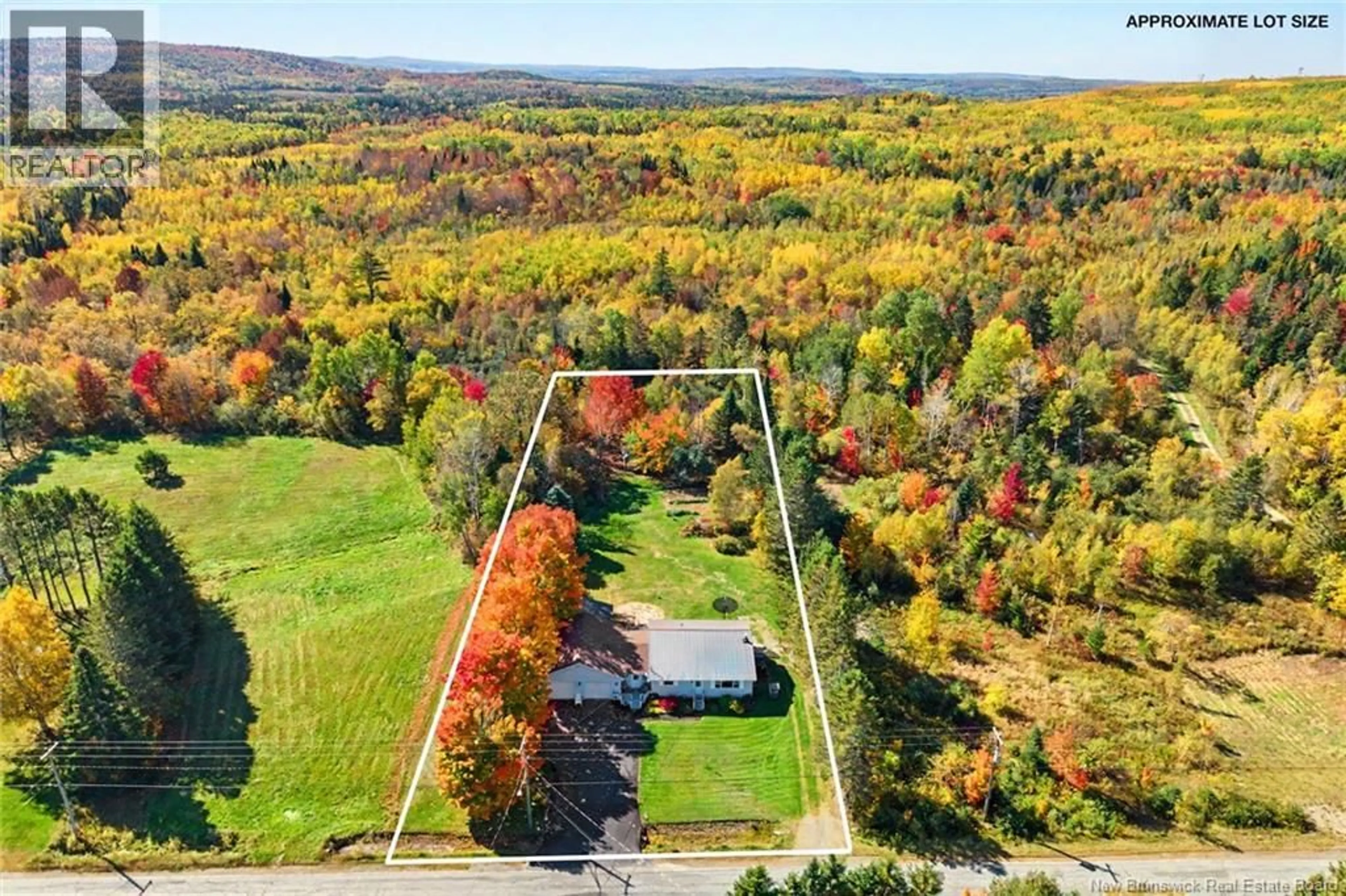 A pic from outside/outdoor area/front of a property/back of a property/a pic from drone, unknown for 4015 ROUTE 104, Millville New Brunswick E6E1S6