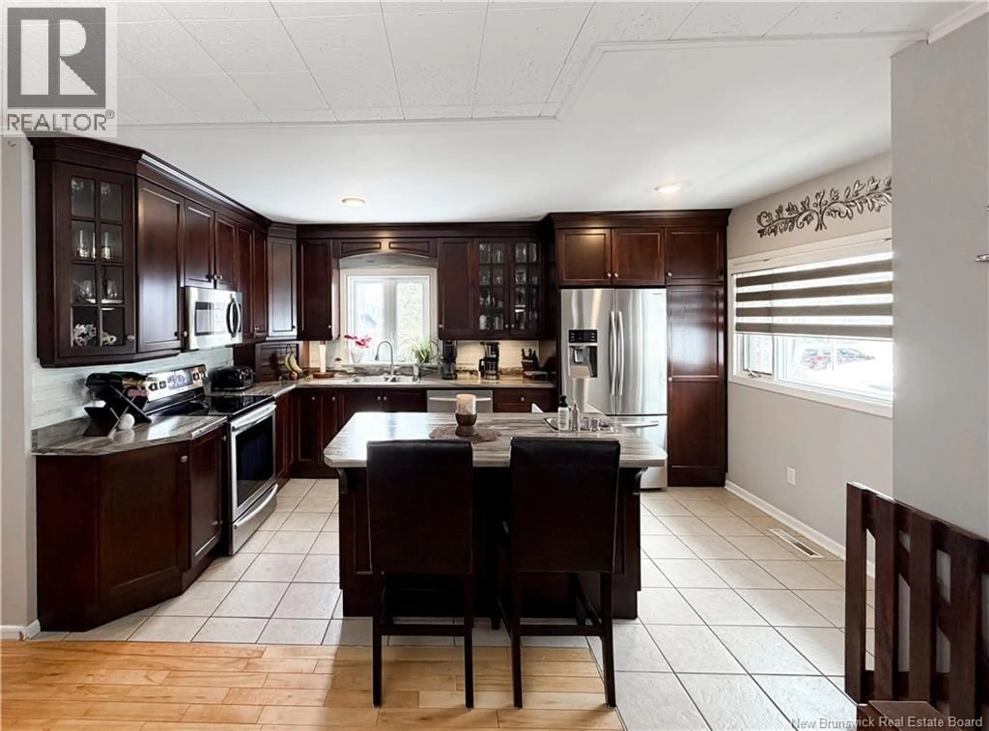 Open concept kitchen, ceramic/tile floor for 9 STANLEY STREET, Campbellton New Brunswick E3N1G7
