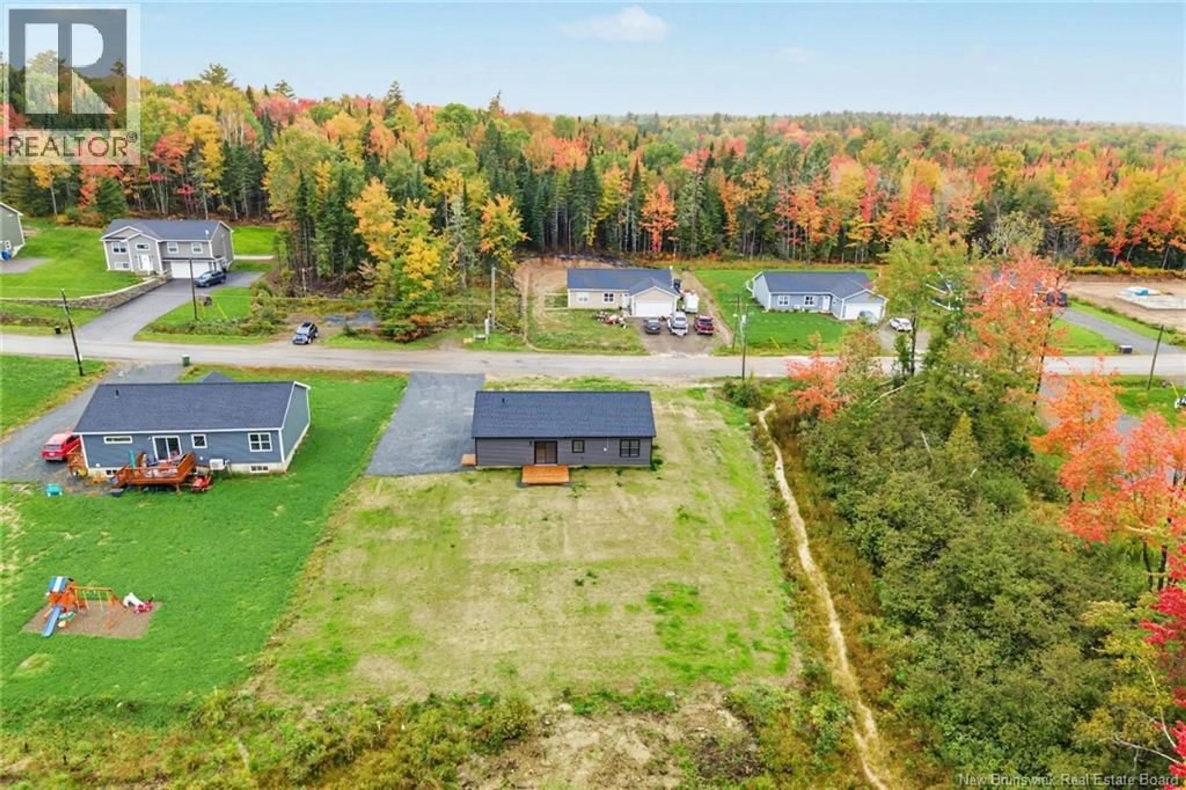 A pic from outside/outdoor area/front of a property/back of a property/a pic from drone, unknown for 136 HORSEMAN ROAD, Fredericton Junction New Brunswick E5L1W5