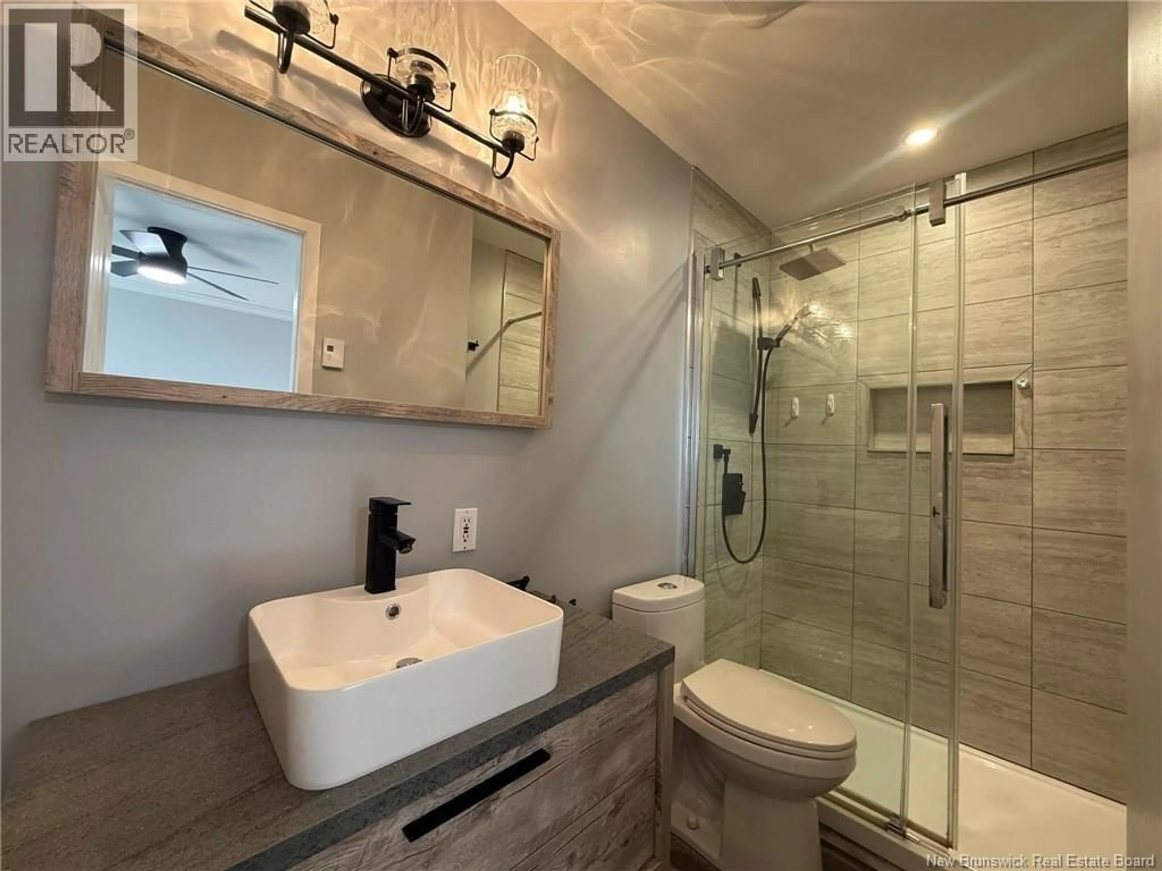 Contemporary bathroom, ceramic/tile floor for 63 PREMIERE AVENUE, Sainte-Anne-De-Madawaska New Brunswick E7E1J9