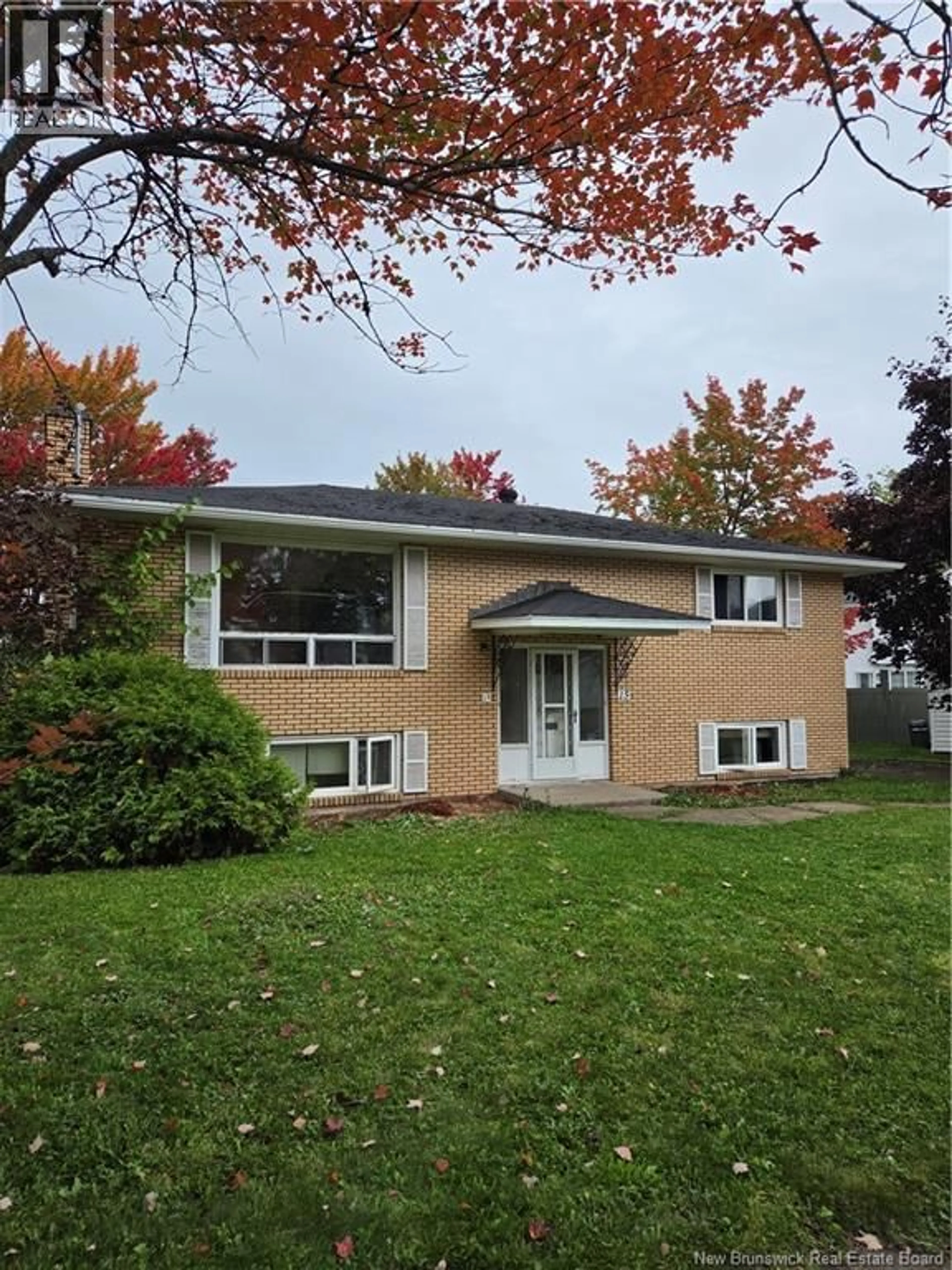 Home with vinyl exterior material, street for 15 WILLETT STREET, Moncton New Brunswick E1C8A2
