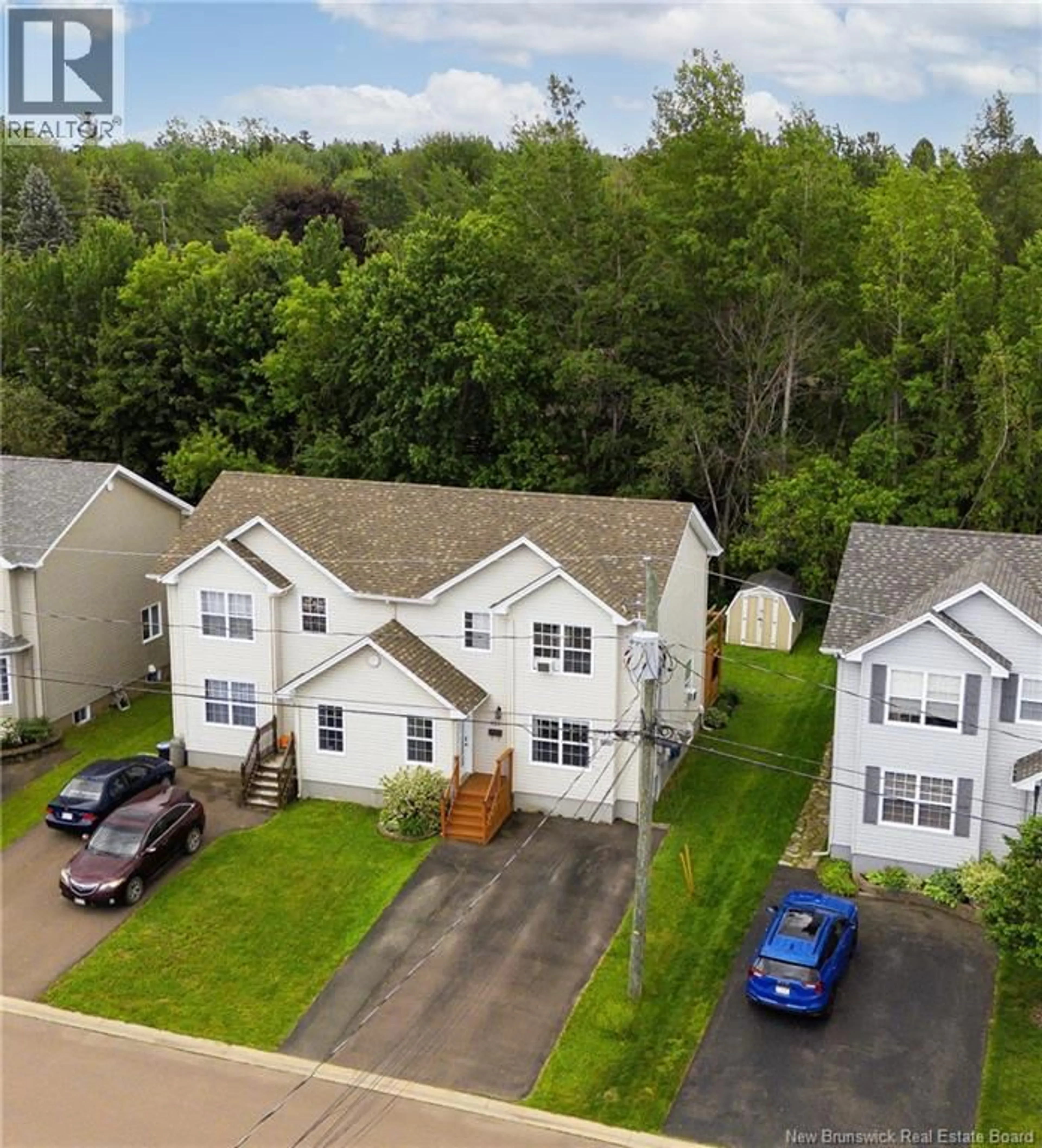 A pic from outside/outdoor area/front of a property/back of a property/a pic from drone, street for 101 MERLOT CRESCENT, Dieppe New Brunswick E1A7W4