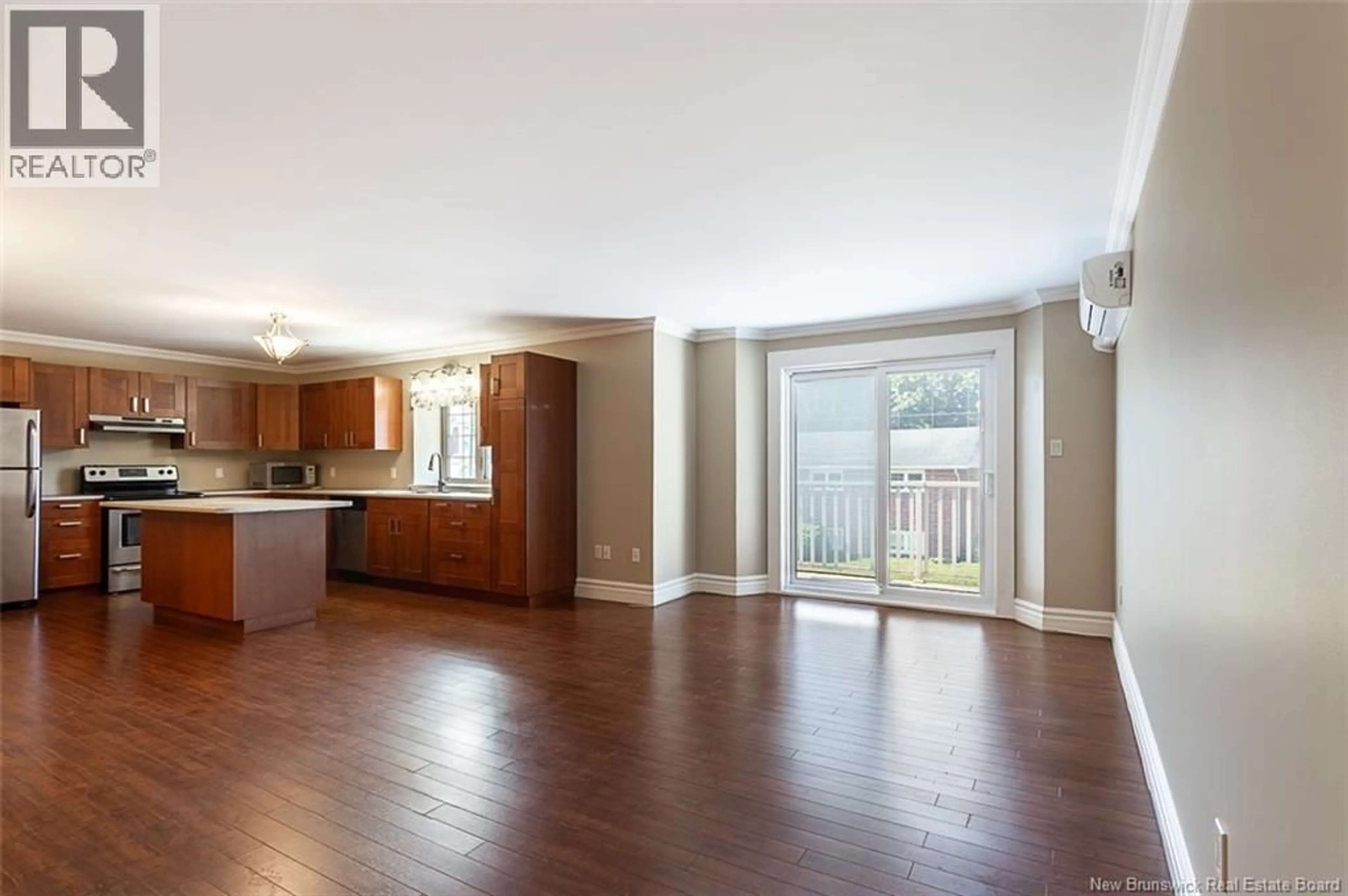Open concept kitchen, wood/laminate floor for 203 - 98 PLEASANT STREET, Shediac New Brunswick E4P2L6