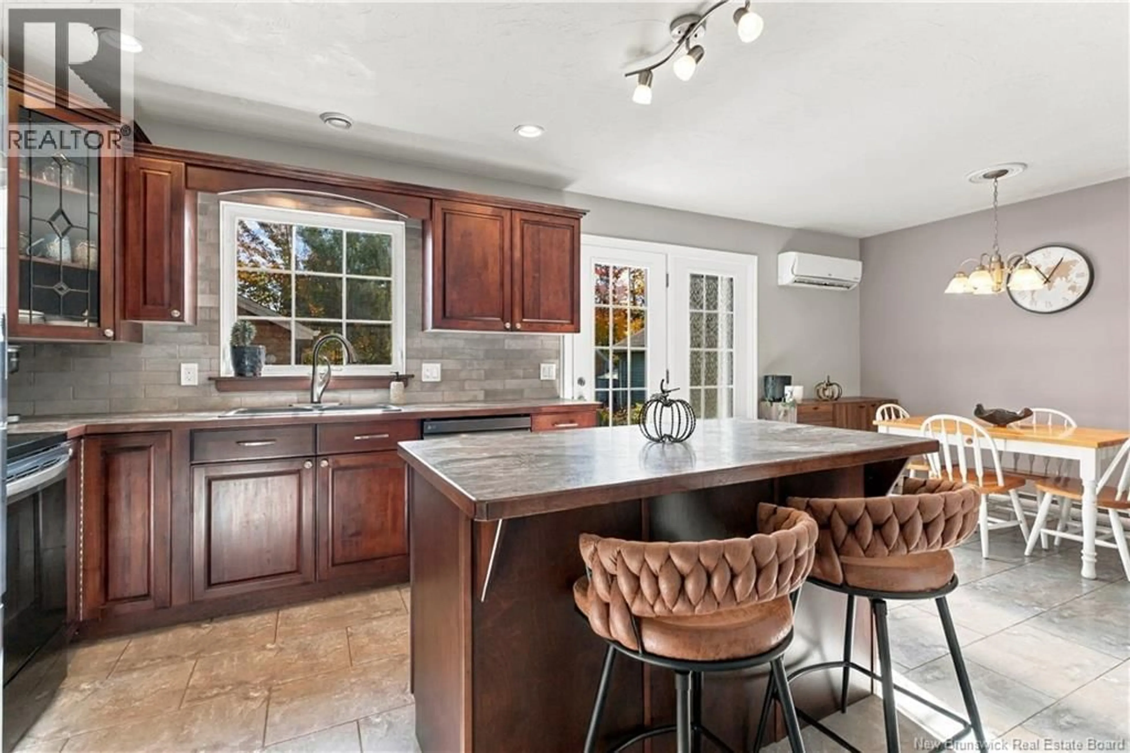 Open concept kitchen, ceramic/tile floor for 34 CHRISTOPHER CRESCENT, Moncton New Brunswick E1G0A5