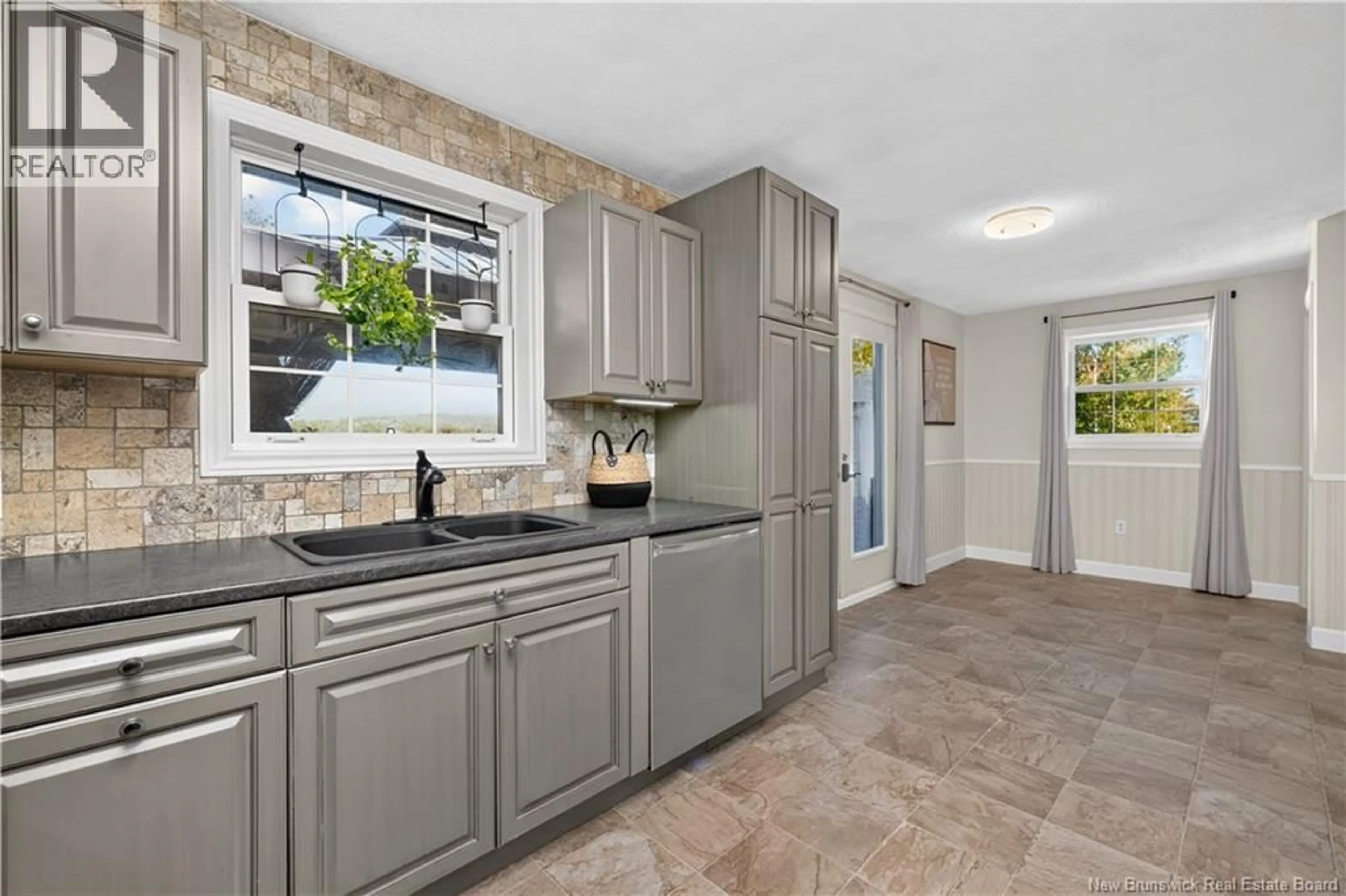 Open concept kitchen, ceramic/tile floor for 83 RENFREW, Petitcodiac New Brunswick E4Z4S6