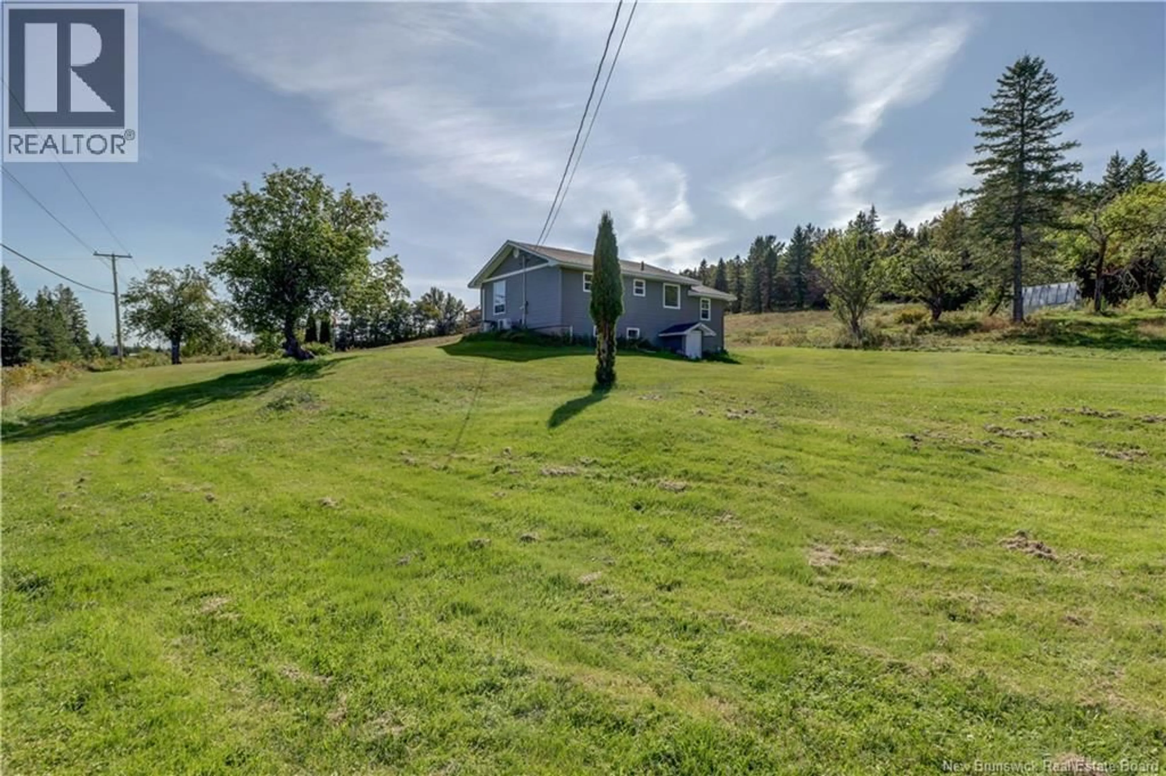 A pic from outside/outdoor area/front of a property/back of a property/a pic from drone, water/lake/river/ocean view for 5977 111 ROUTE, Hammondvale New Brunswick E4E3T1