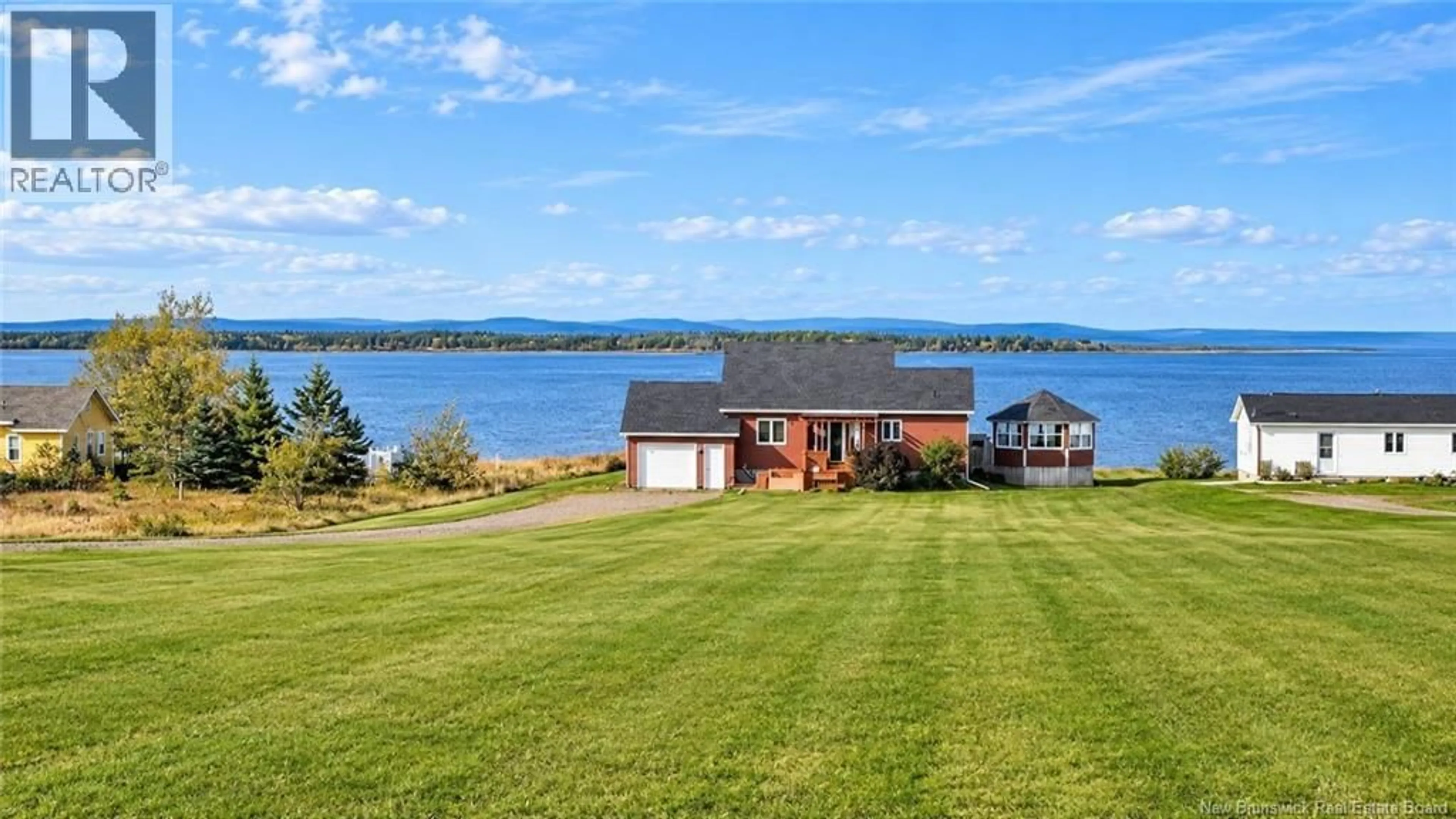 A pic from outside/outdoor area/front of a property/back of a property/a pic from drone, water/lake/river/ocean view for 7739 DU HAVRES STREET, Bas-Caraquet New Brunswick E1W5W9