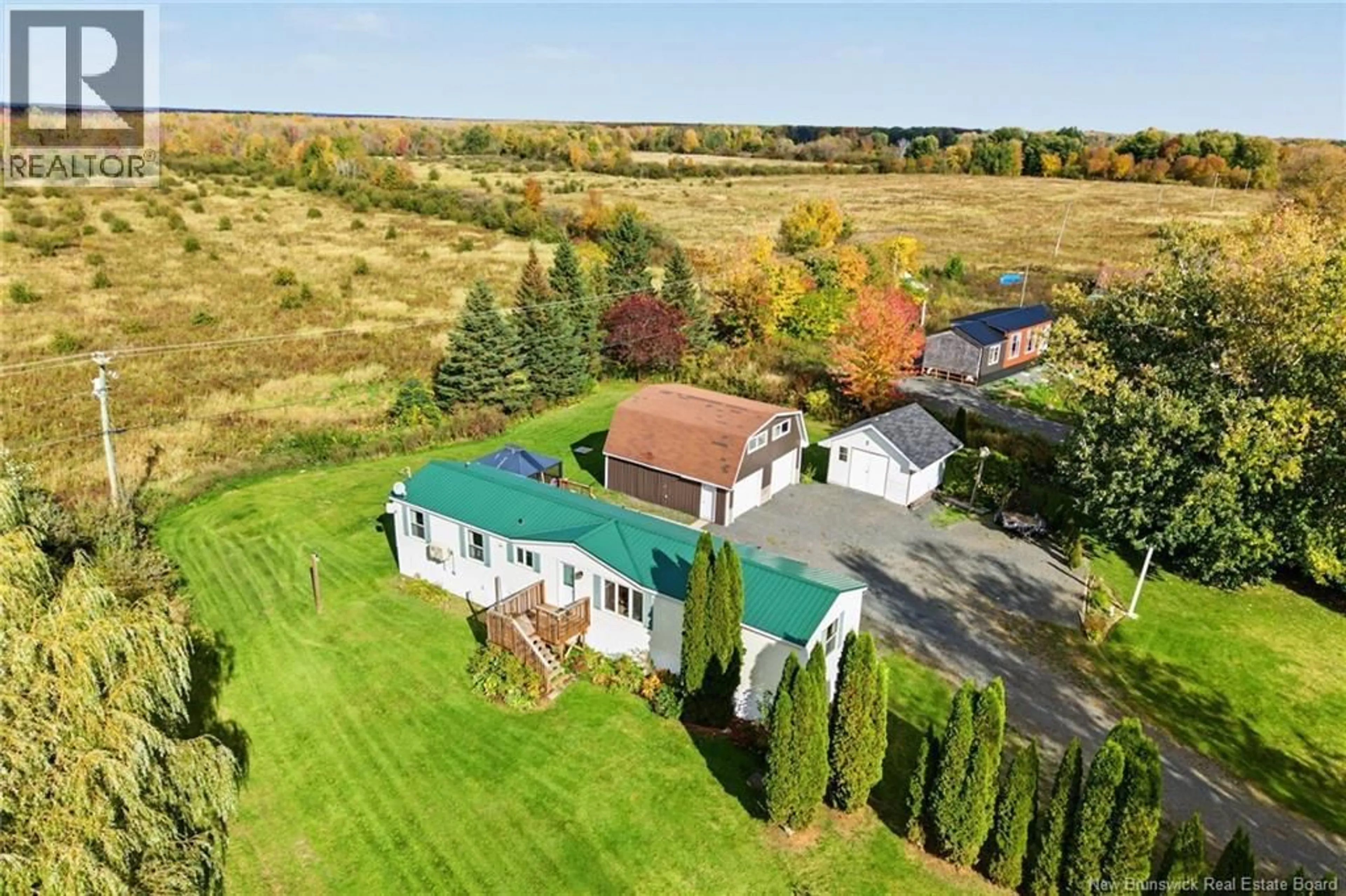 A pic from outside/outdoor area/front of a property/back of a property/a pic from drone, unknown for 1711 ROUTE 105, Maugerville New Brunswick E3A8J4