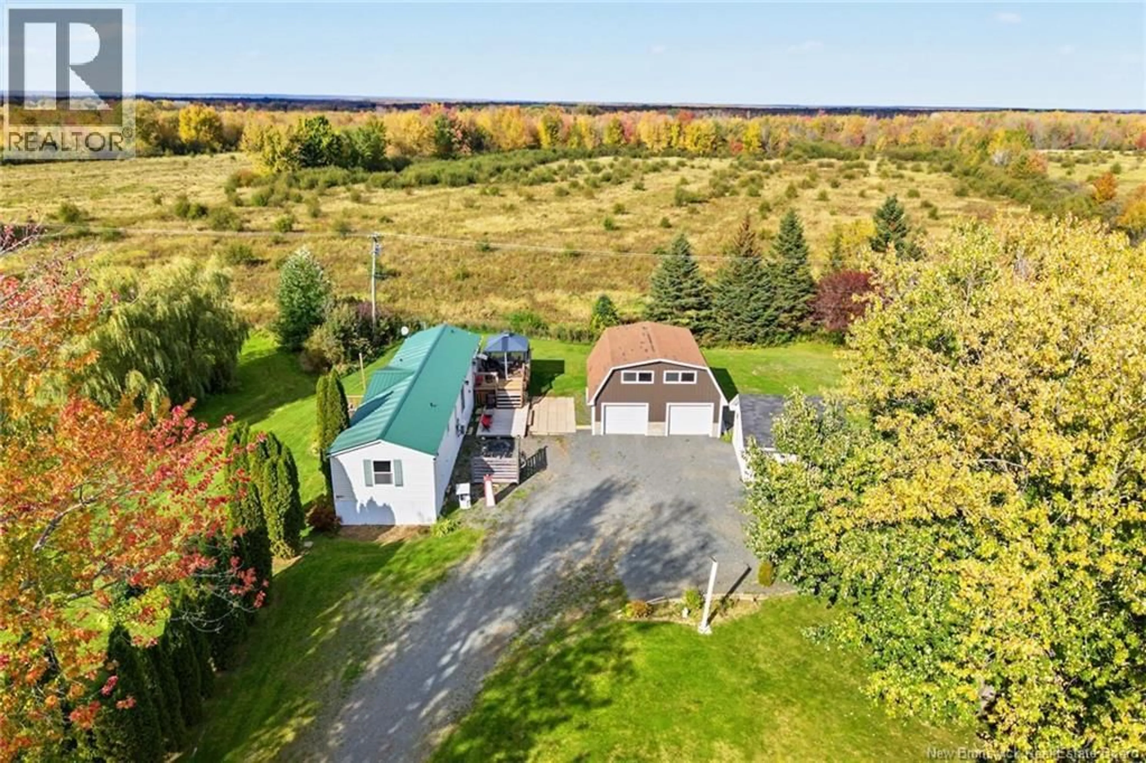 A pic from outside/outdoor area/front of a property/back of a property/a pic from drone, building for 1711 ROUTE 105, Maugerville New Brunswick E3A8J4