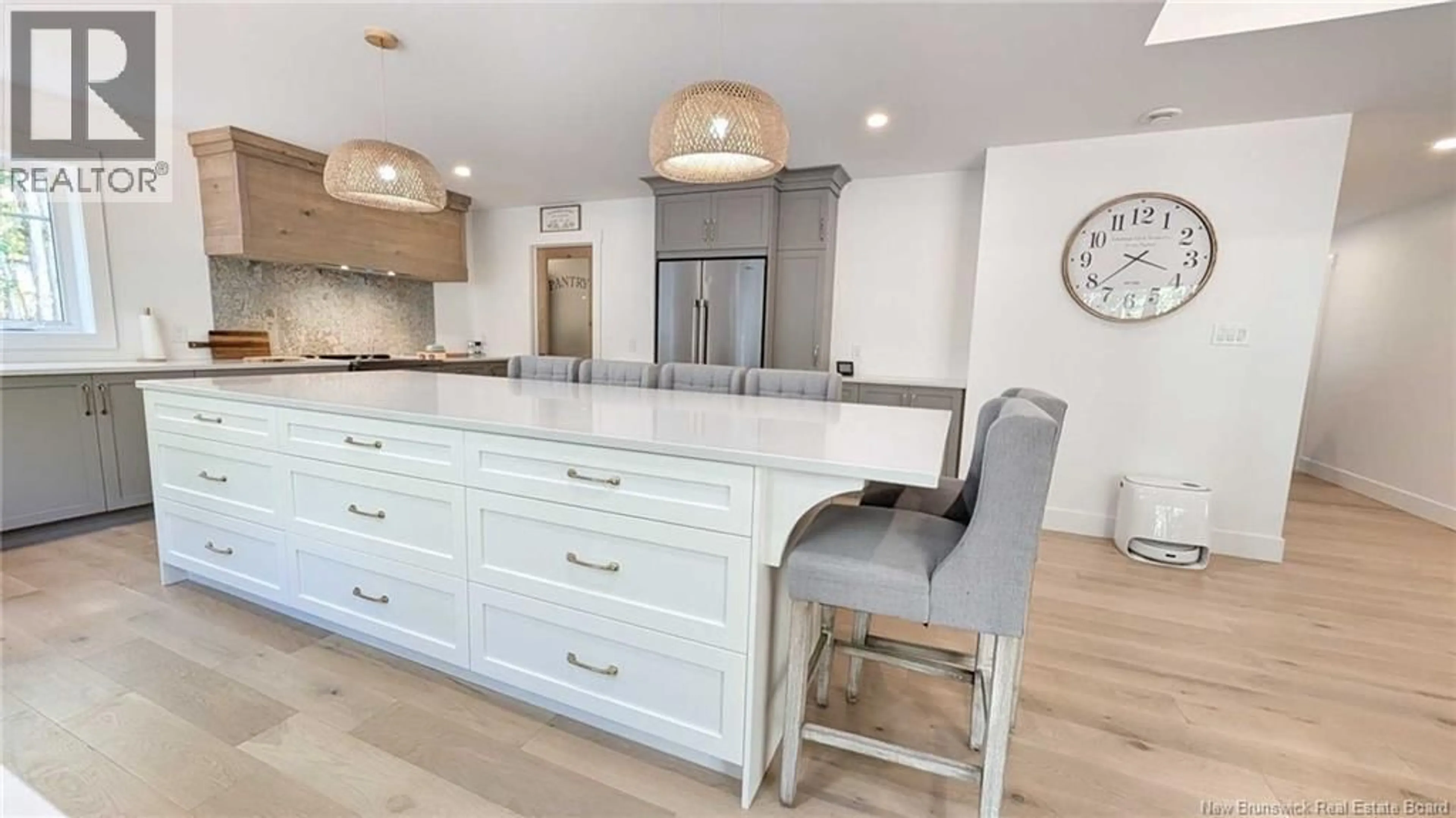 Open concept kitchen, wood/laminate floor for 10858 NB 11, Pokemouche New Brunswick E8P1H6
