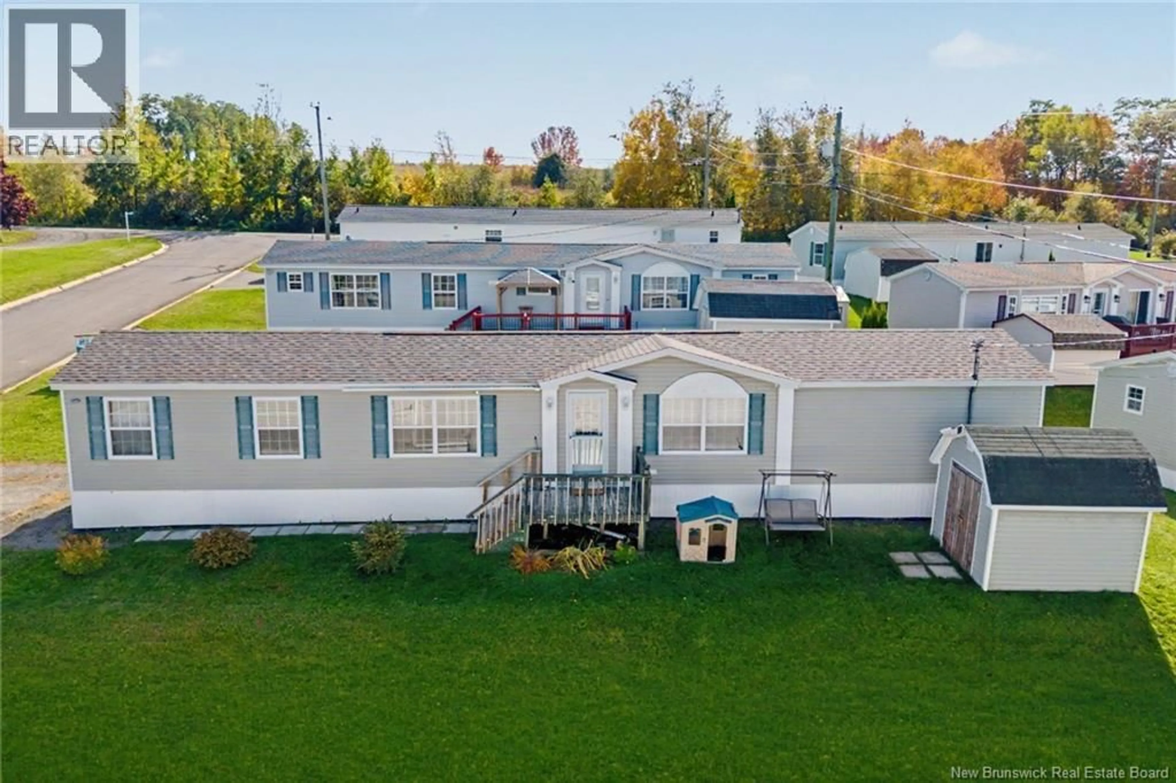A pic from outside/outdoor area/front of a property/back of a property/a pic from drone, water/lake/river/ocean view for 15 SENATOR DRIVE, Fredericton New Brunswick E3C1L8