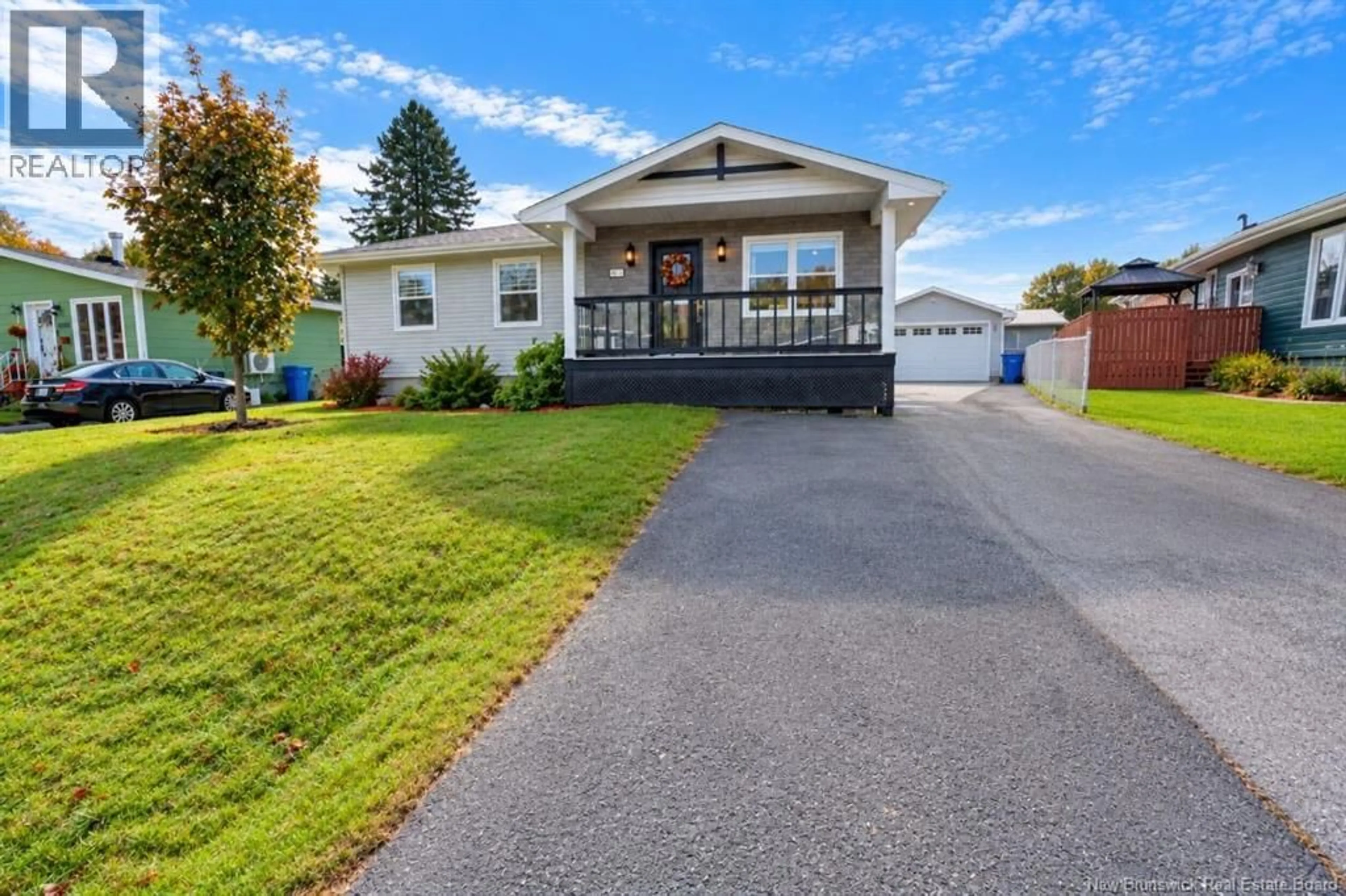Home with vinyl exterior material, street for 1073 ROCKLAND DRIVE, Bathurst New Brunswick E2A3T8