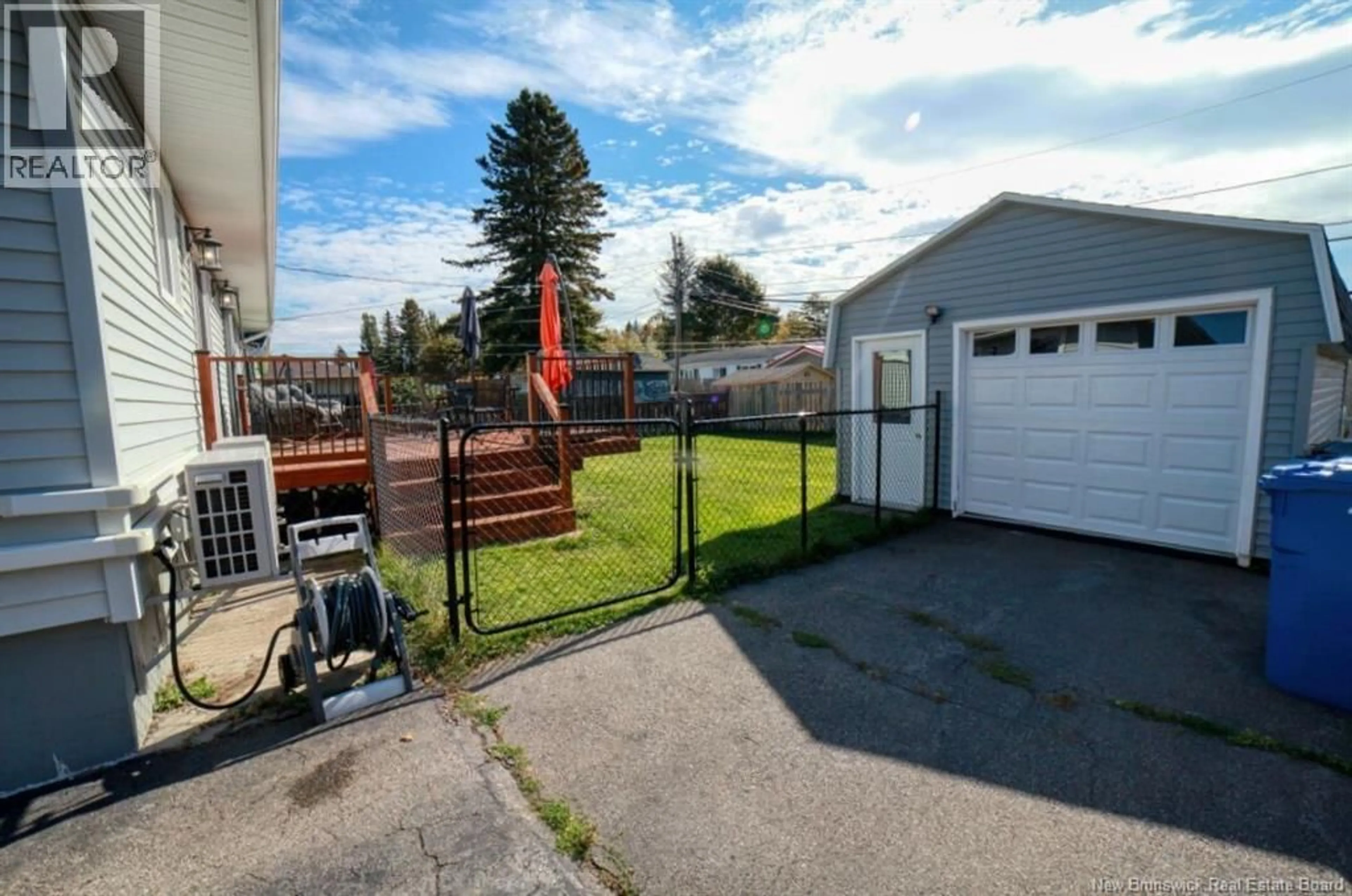 A pic from outside/outdoor area/front of a property/back of a property/a pic from drone, street for 1073 ROCKLAND DRIVE, Bathurst New Brunswick E2A3T8