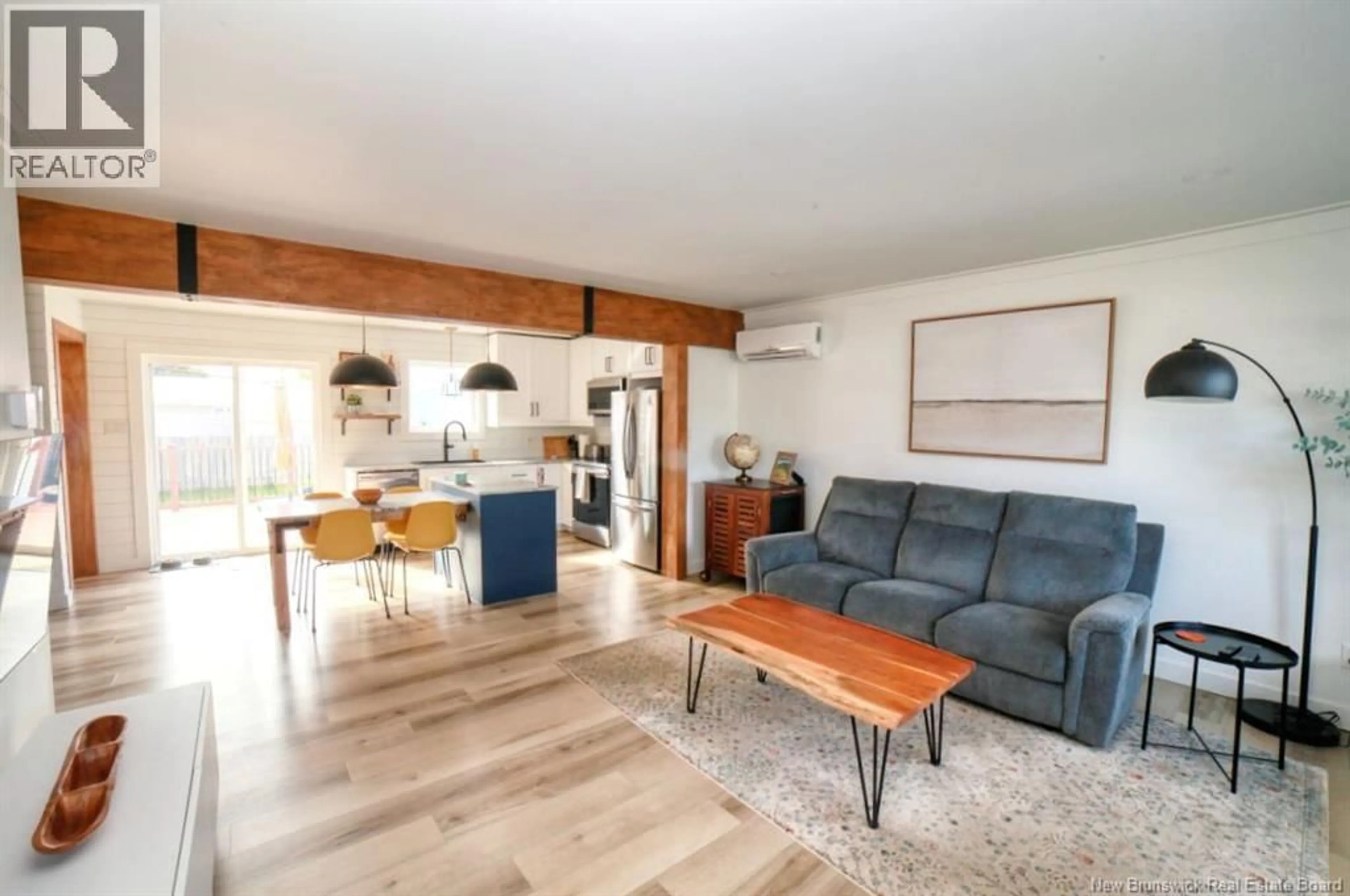 Living room with furniture, wood/laminate floor for 1073 ROCKLAND DRIVE, Bathurst New Brunswick E2A3T8