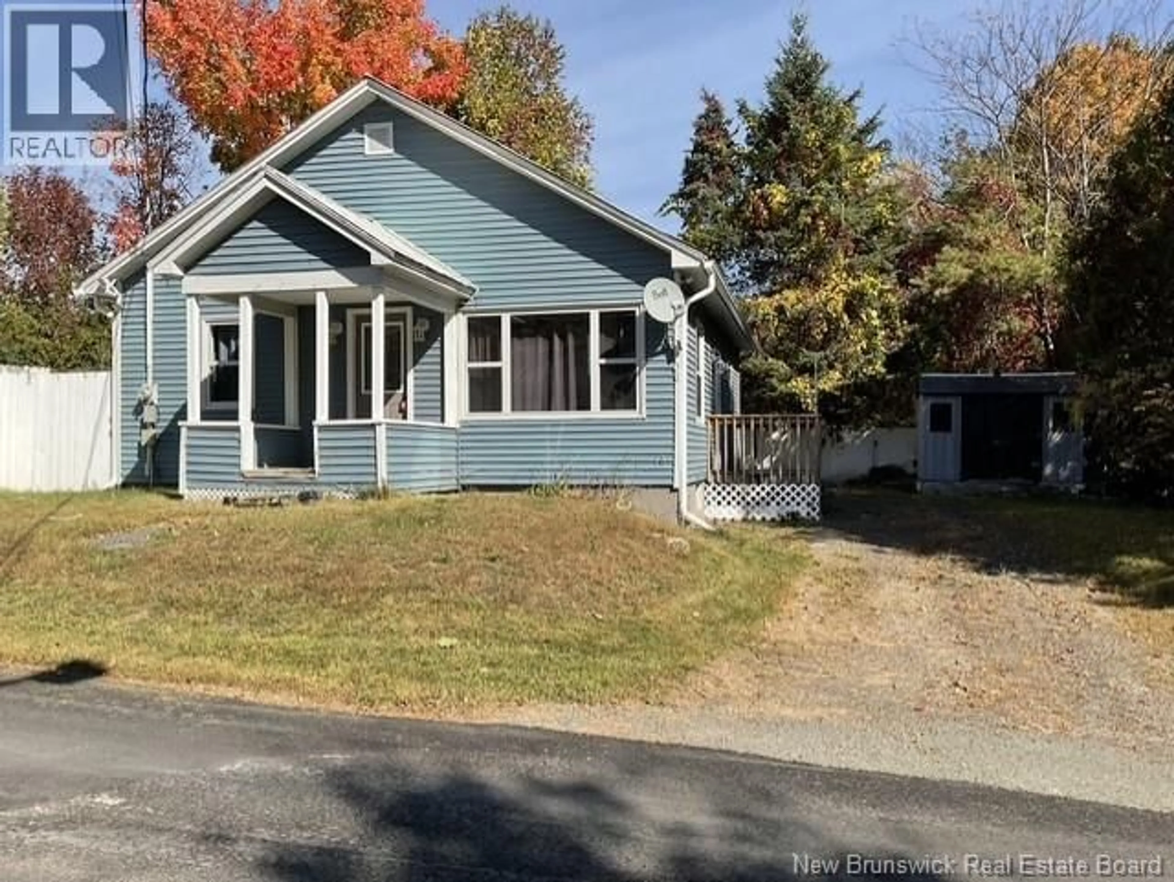 Home with vinyl exterior material, street for 106 KING STREET, Woodstock New Brunswick E7M2A2