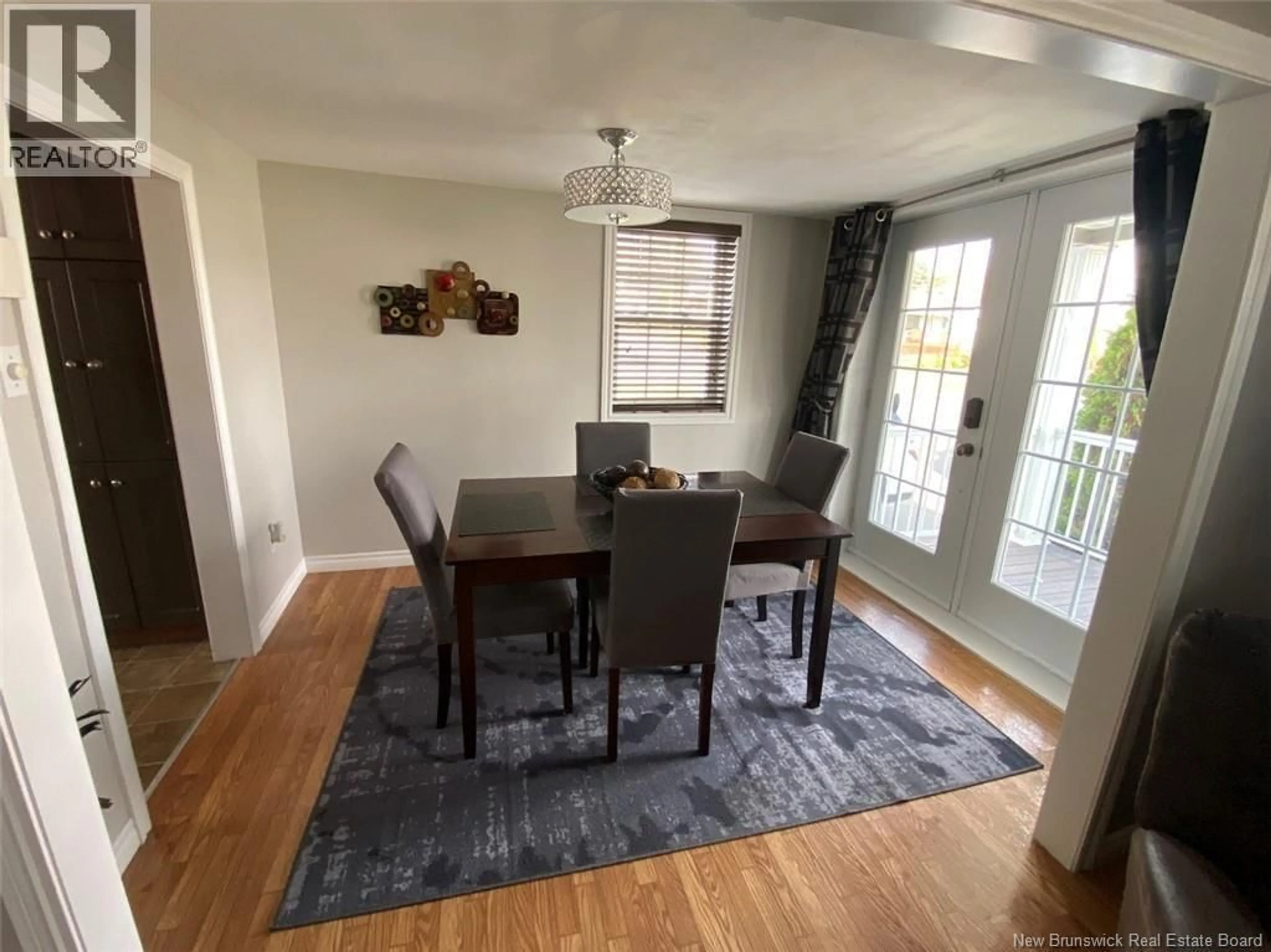Dining room, wood/laminate floor for 16 46TH AVENUE, Edmundston New Brunswick E3V3B2