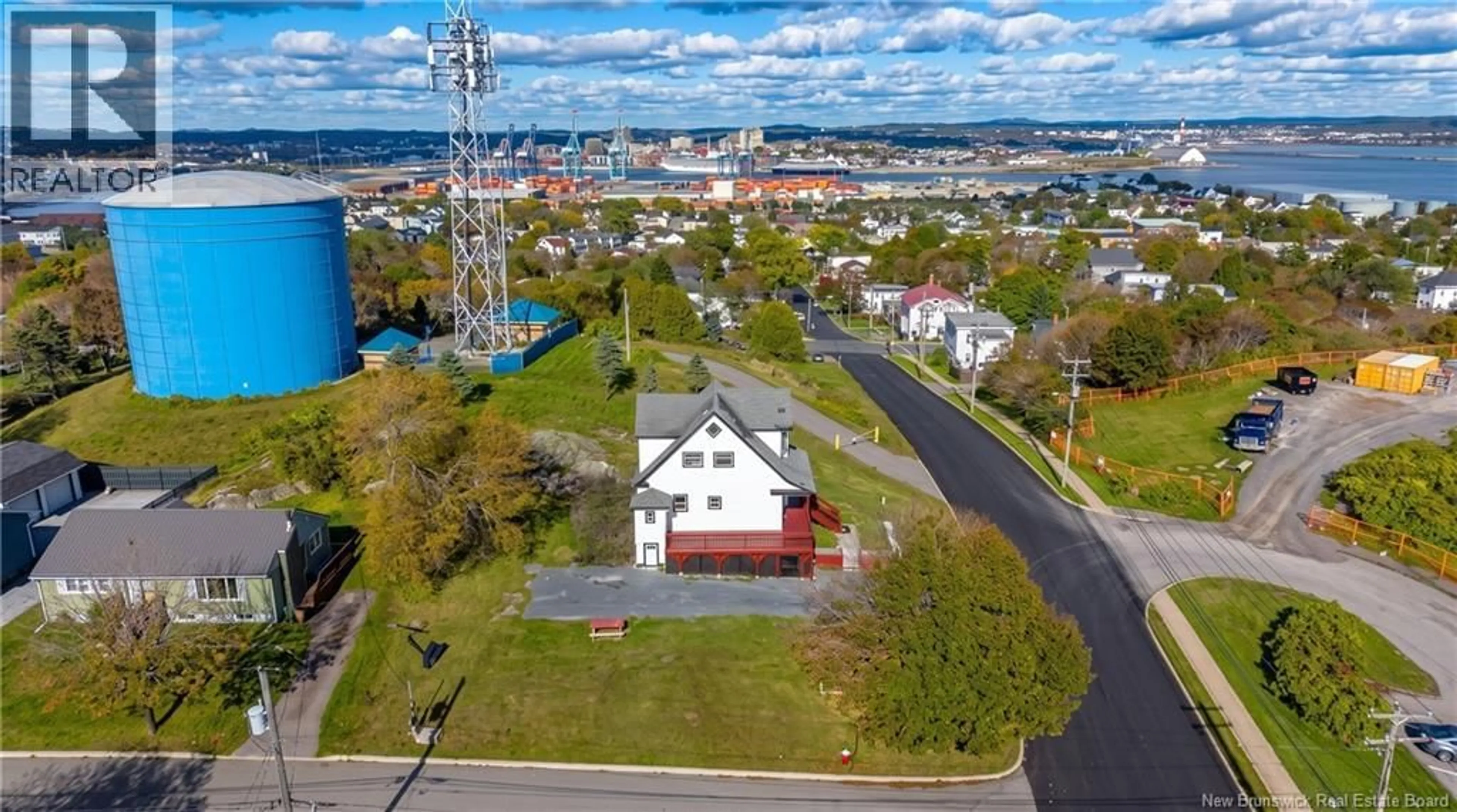 A pic from outside/outdoor area/front of a property/back of a property/a pic from drone, water/lake/river/ocean view for 677 FUNDY DRIVE, Saint John New Brunswick E2M2S6