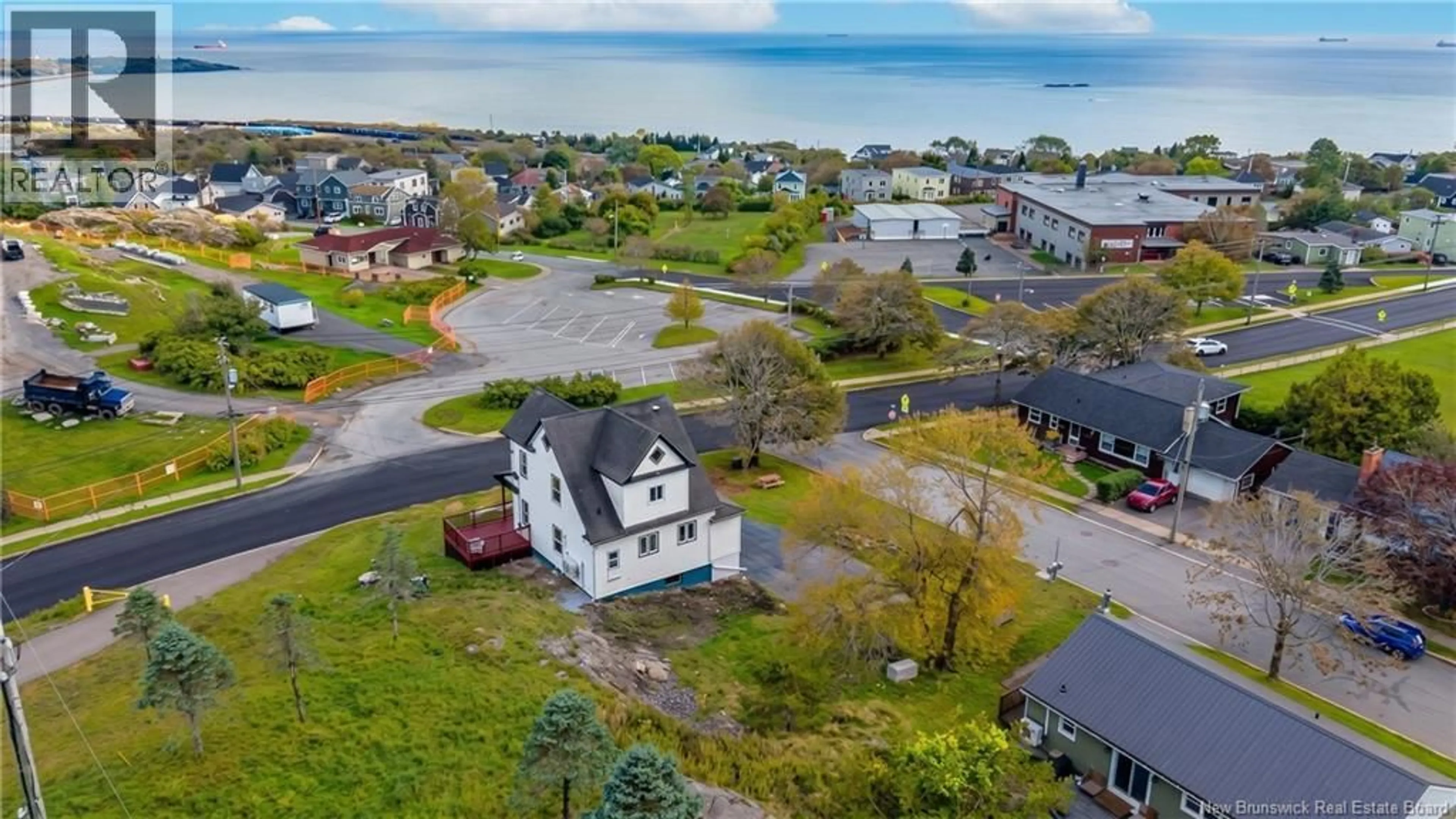A pic from outside/outdoor area/front of a property/back of a property/a pic from drone, water/lake/river/ocean view for 677 FUNDY DRIVE, Saint John New Brunswick E2M2S6