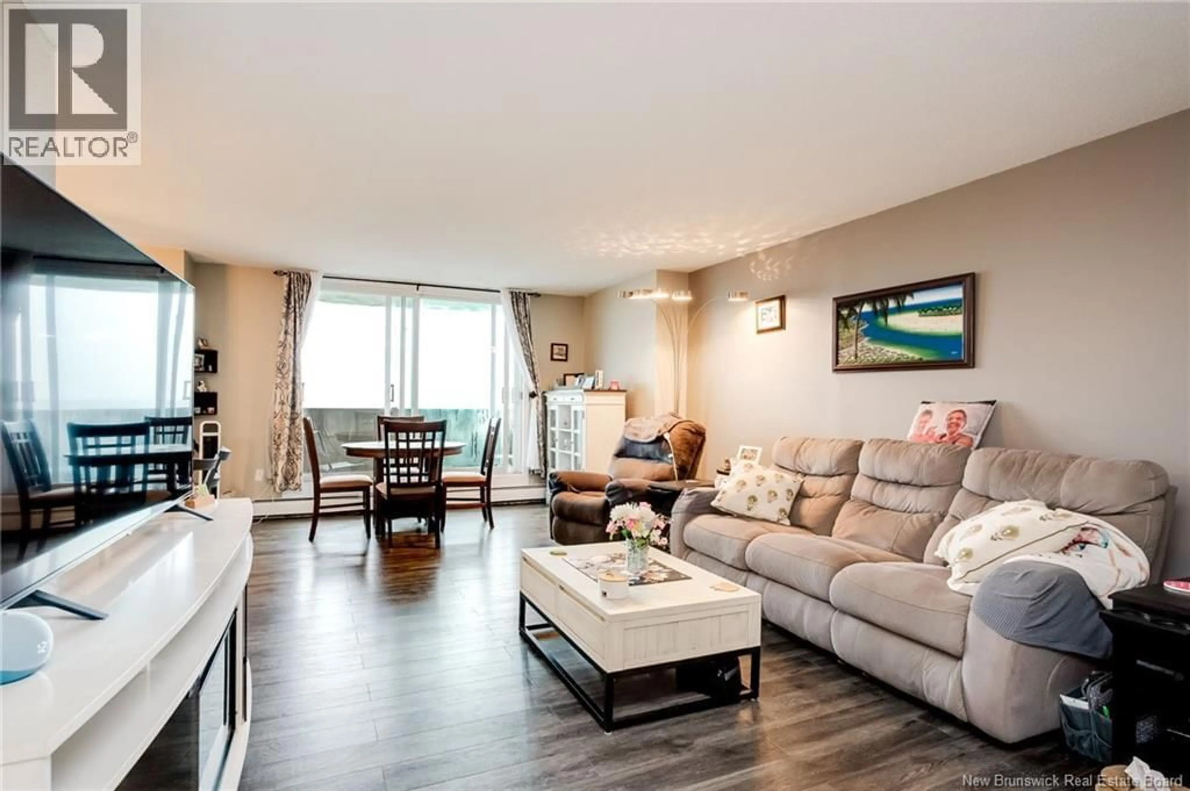 Living room with furniture, wood/laminate floor for 1214 - 310 WOODWARD AVENUE, Saint John New Brunswick E2K2L1