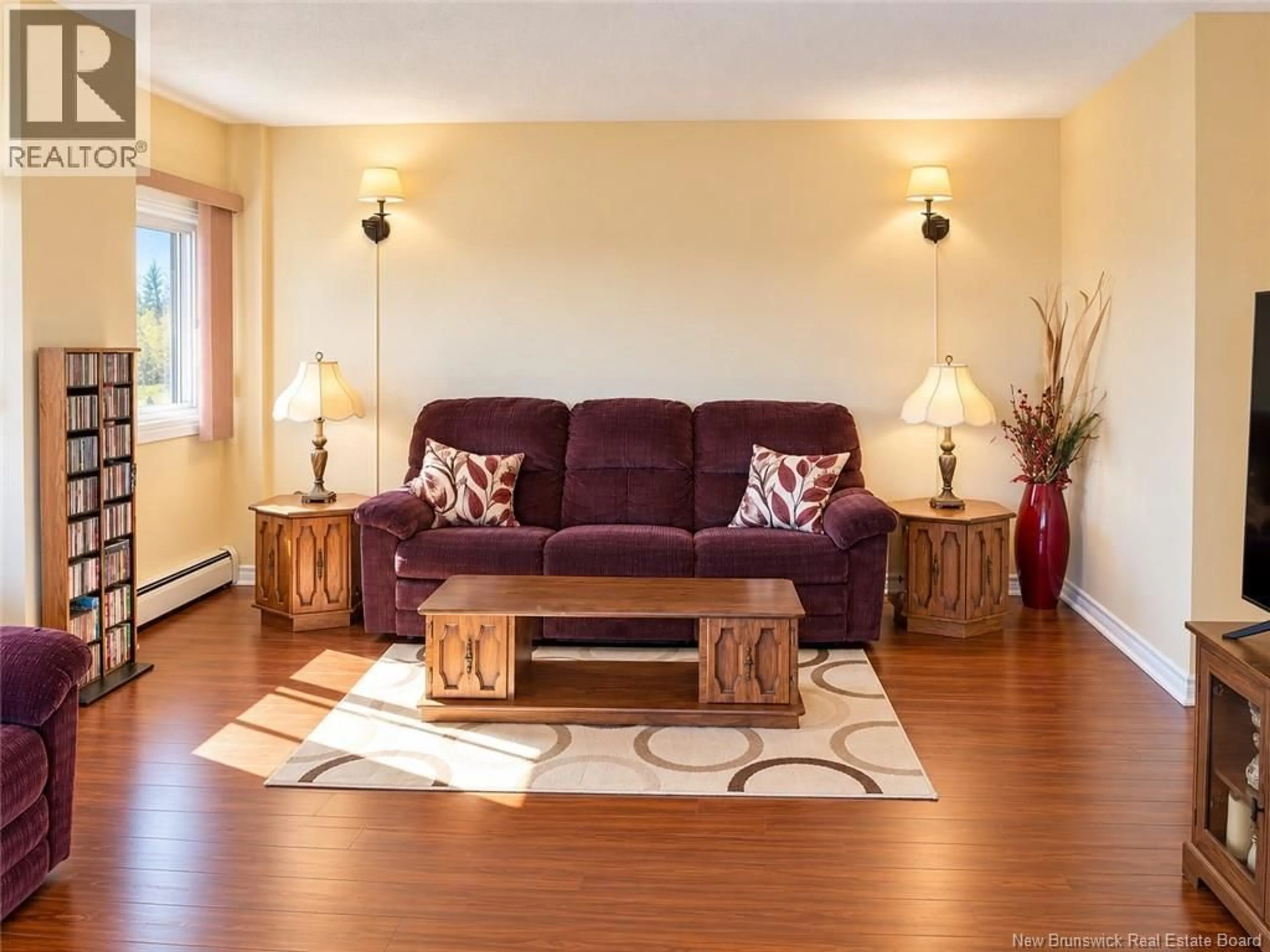 Living room with furniture, wood/laminate floor for 1114 - 310 WOODWARD AVENUE, Saint John New Brunswick E2K2L1