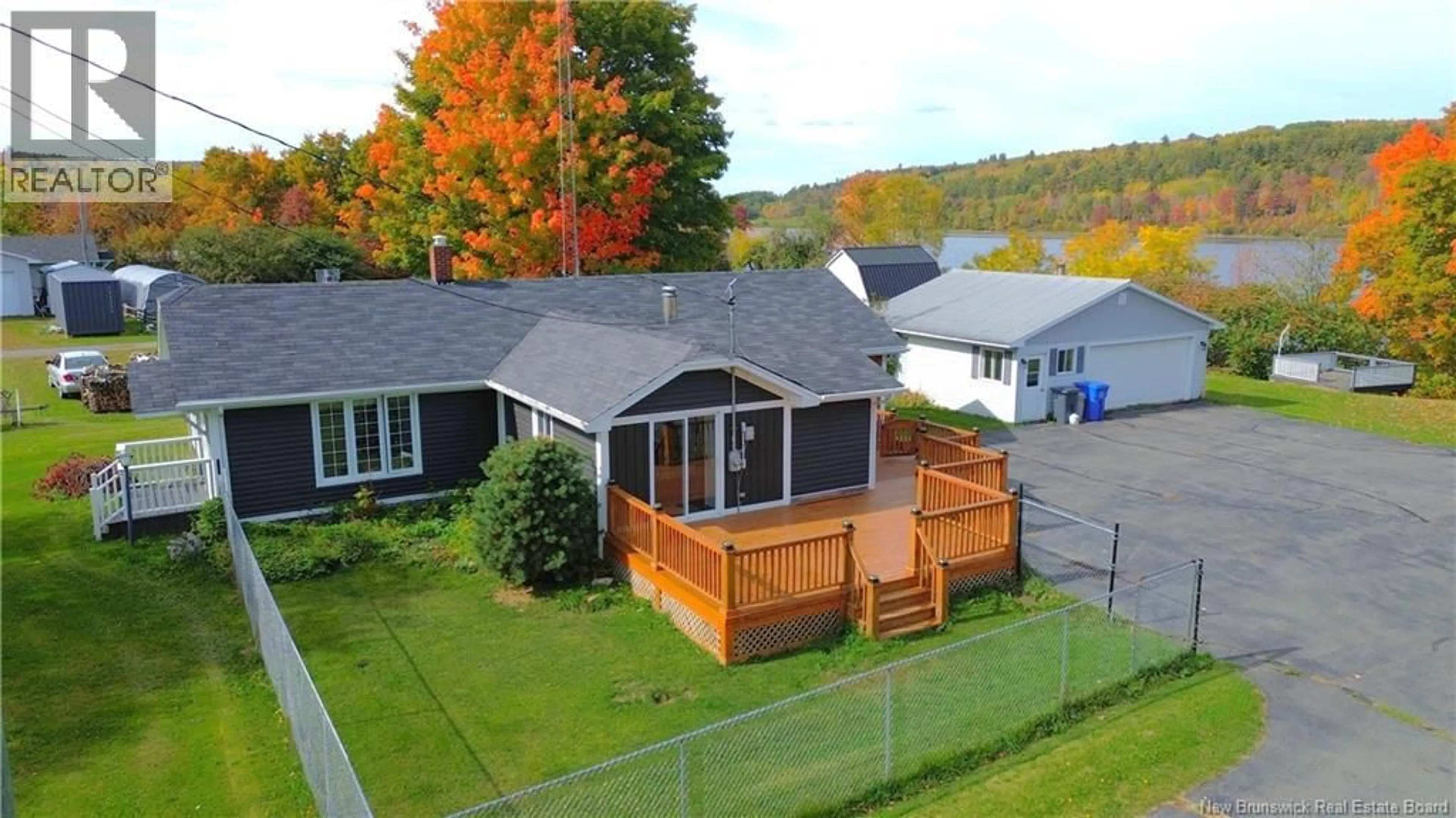 A pic from outside/outdoor area/front of a property/back of a property/a pic from drone, water/lake/river/ocean view for 55 MAIN STREET, Meductic New Brunswick E6H1E3