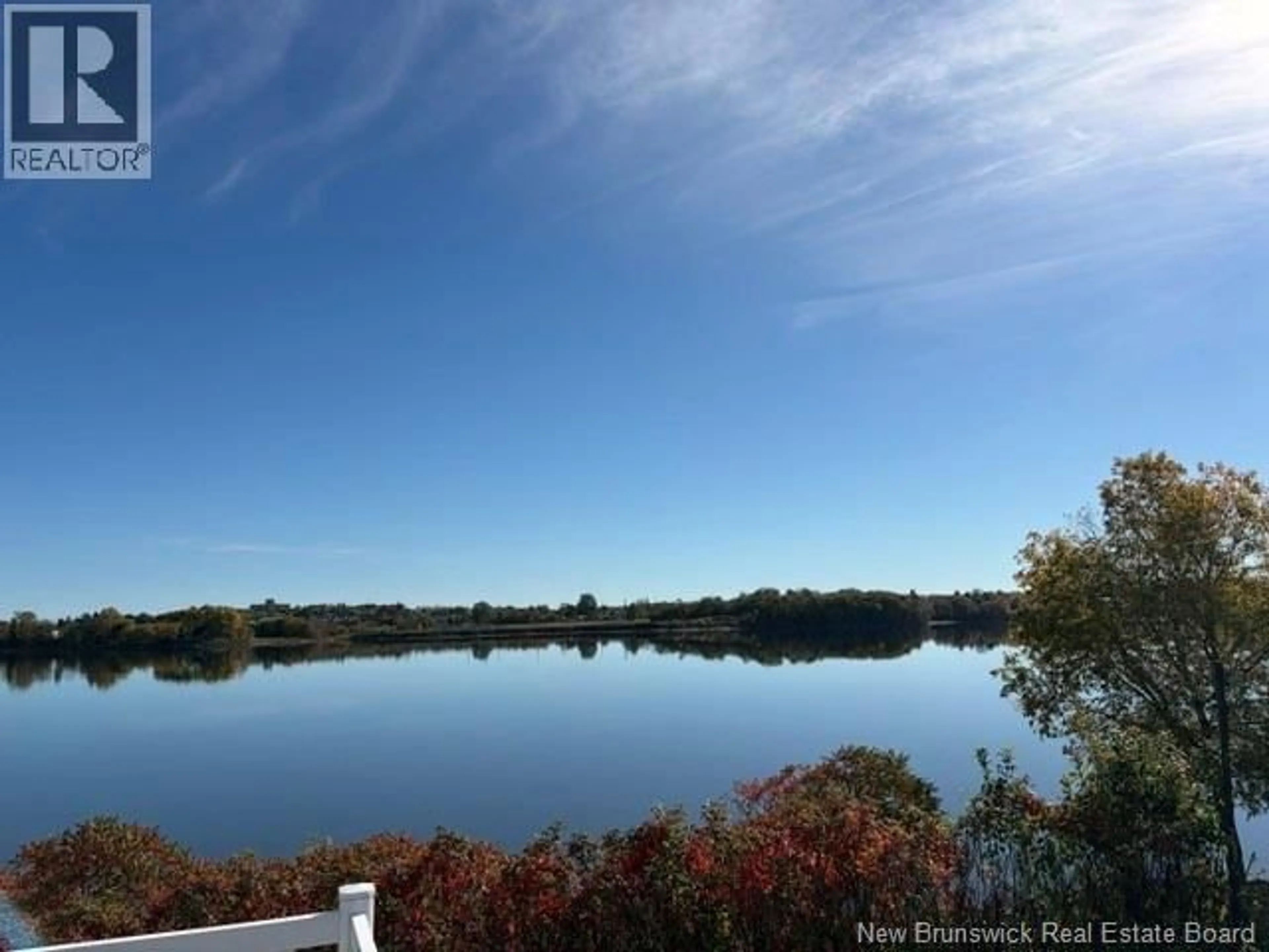 A pic from outside/outdoor area/front of a property/back of a property/a pic from drone, water/lake/river/ocean view for 1015 WINSTON CRESCENT, Bathurst New Brunswick E2A4G6