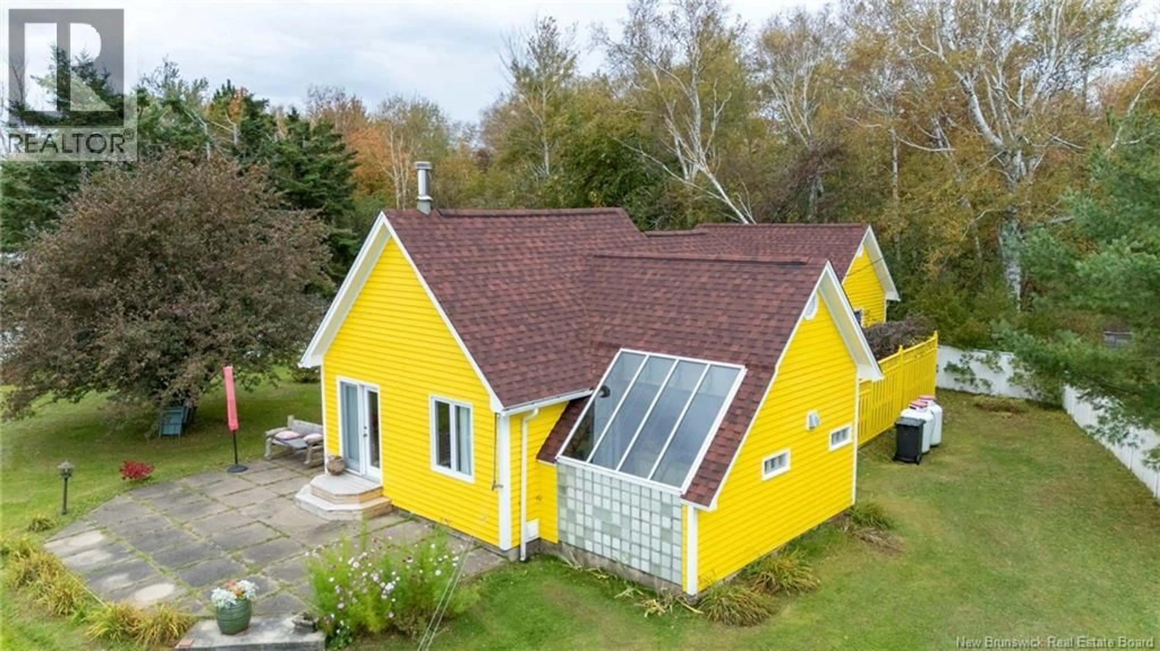 A pic from outside/outdoor area/front of a property/back of a property/a pic from drone, building for 34 ALLEE BORGETTE, Bas Cap Pele New Brunswick E4N3B1