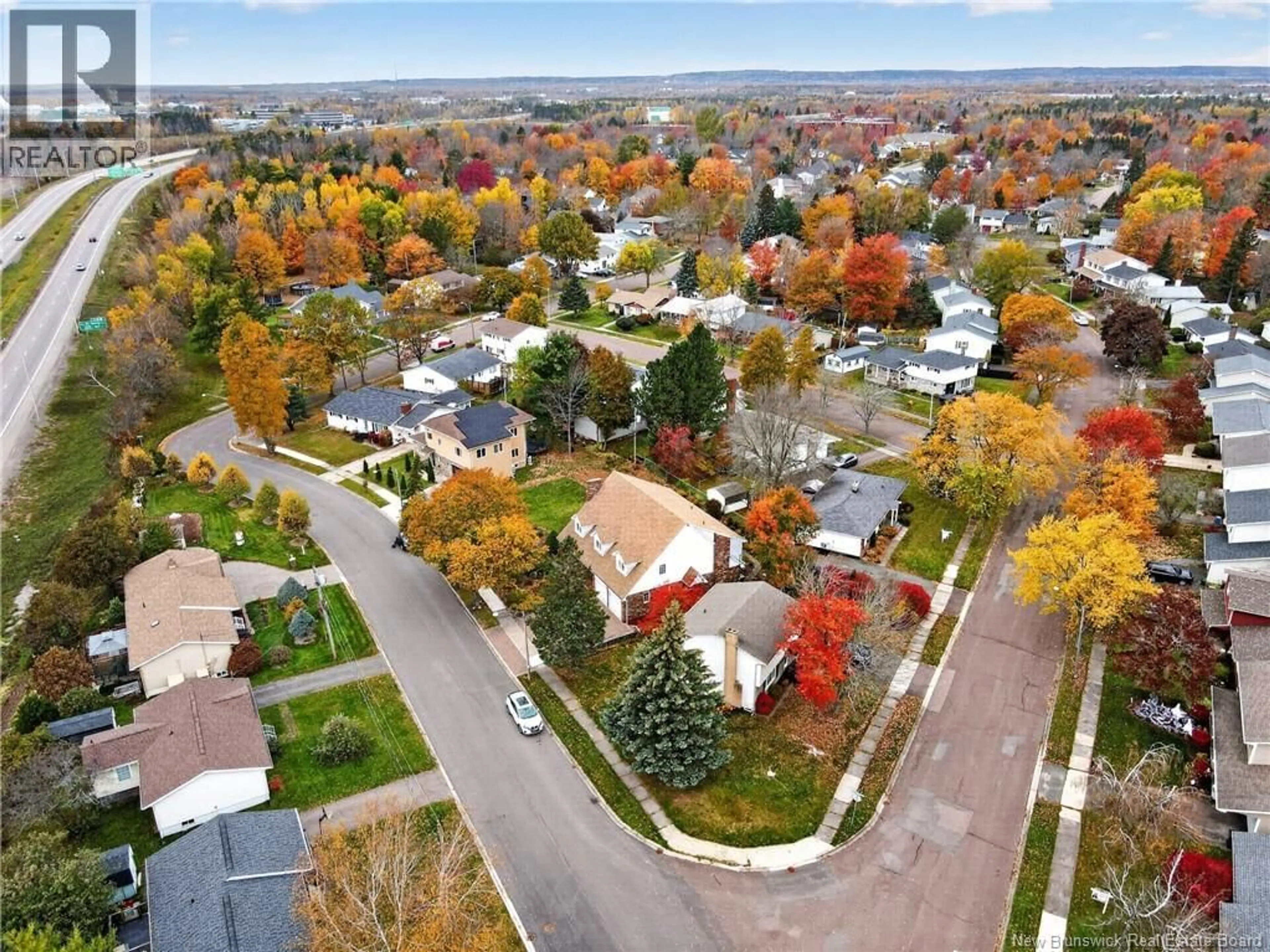 A pic from outside/outdoor area/front of a property/back of a property/a pic from drone, street for 39 KENWOOD DRIVE, Moncton New Brunswick E1E3Z2