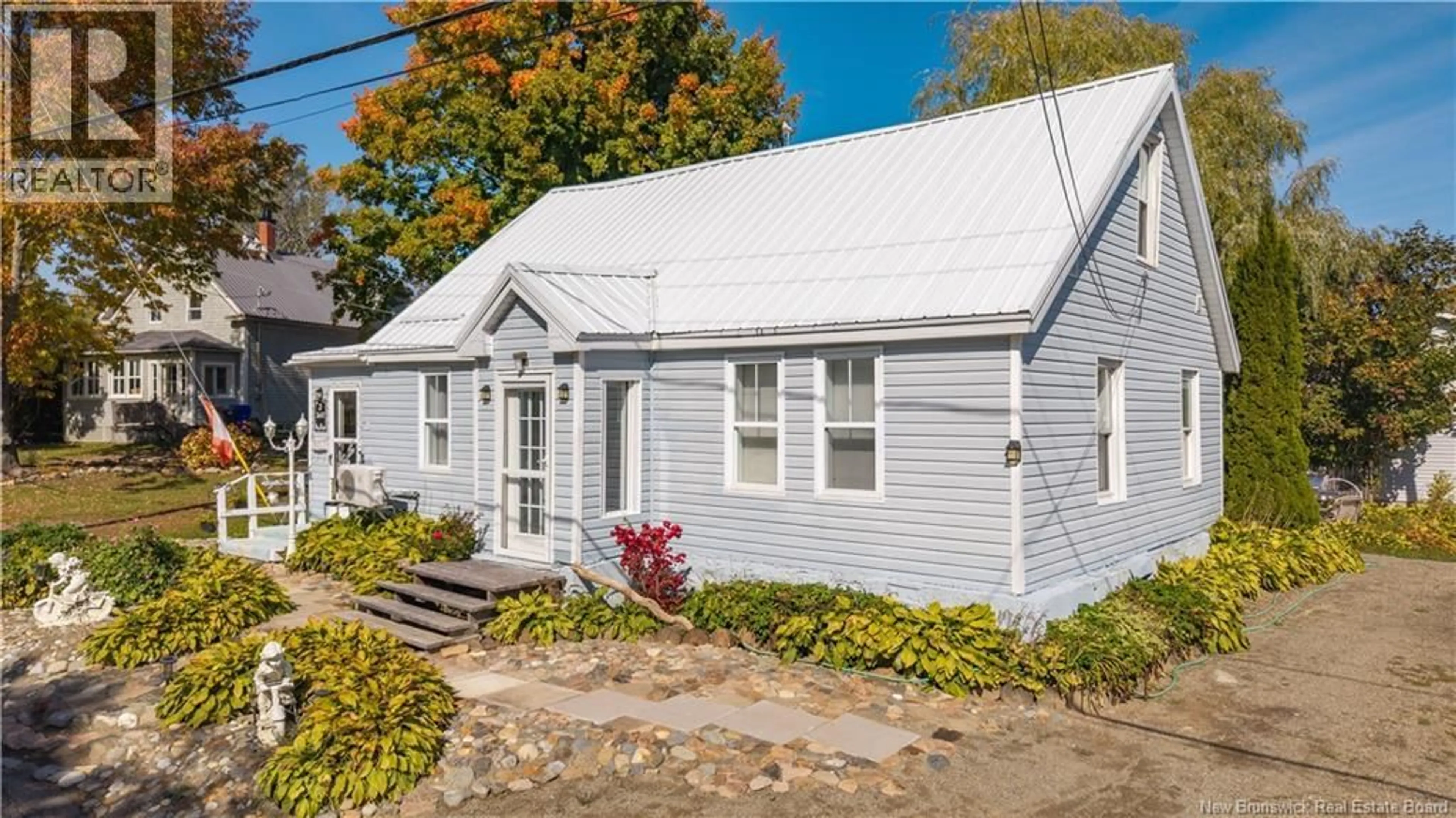 Home with vinyl exterior material, street for 3 PLEASANT STREET, St. Stephen New Brunswick E3L1A1