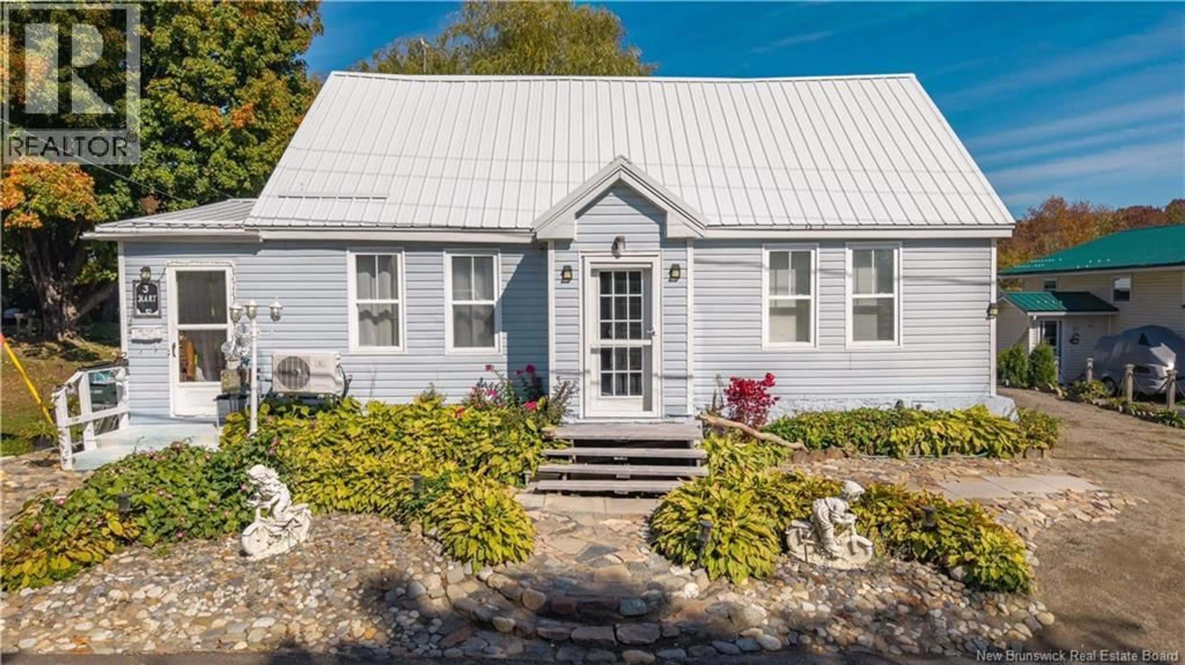 Home with vinyl exterior material, street for 3 PLEASANT STREET, St. Stephen New Brunswick E3L1A1