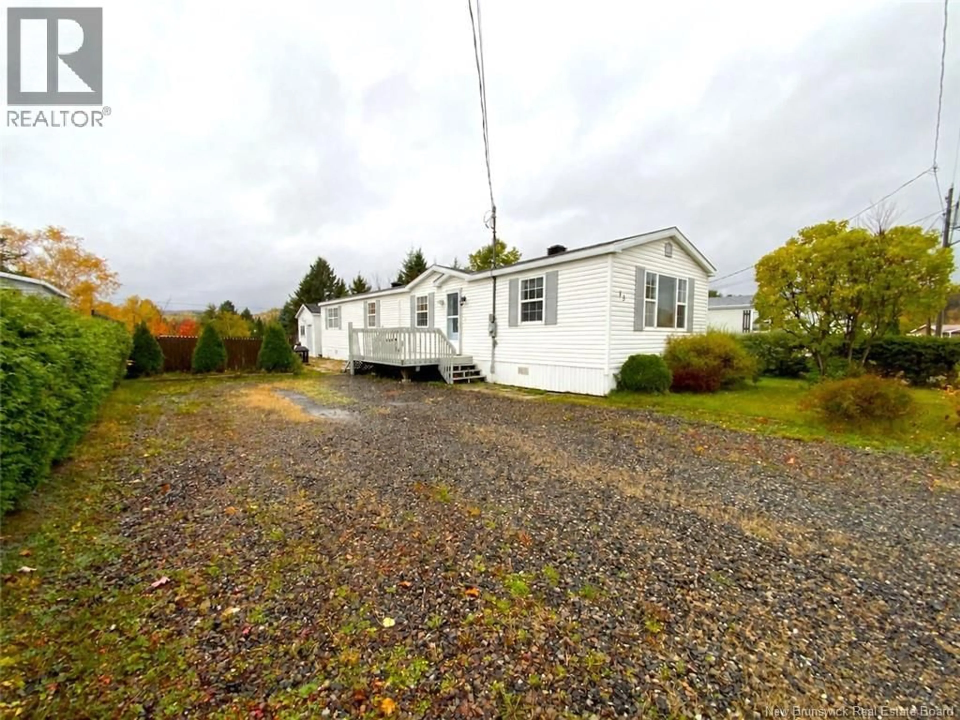 A pic from outside/outdoor area/front of a property/back of a property/a pic from drone, building for 13 DU BOULEAU STREET, Saint-Jacques New Brunswick E7B1R7