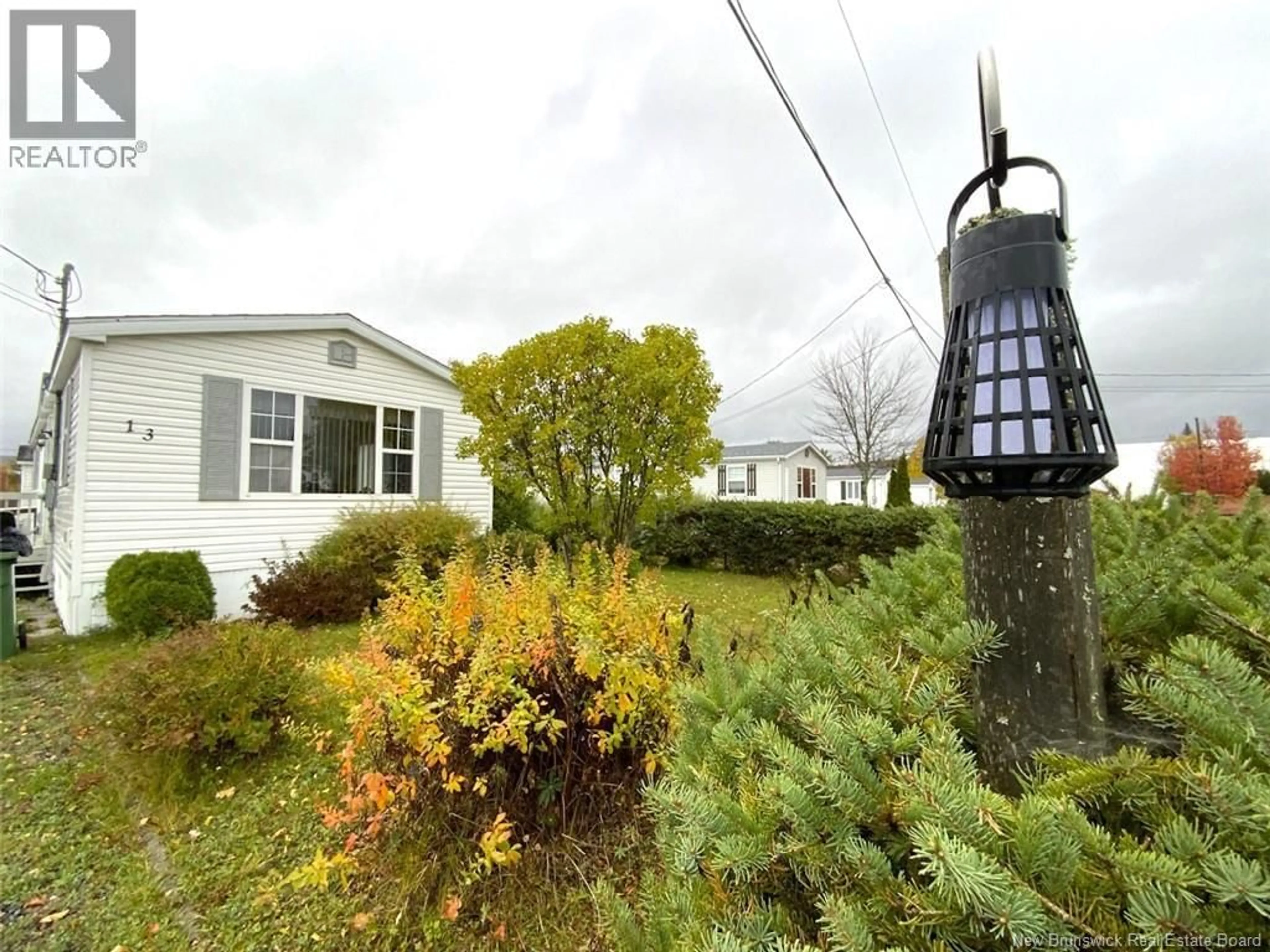 A pic from outside/outdoor area/front of a property/back of a property/a pic from drone, street for 13 DU BOULEAU STREET, Saint-Jacques New Brunswick E7B1R7