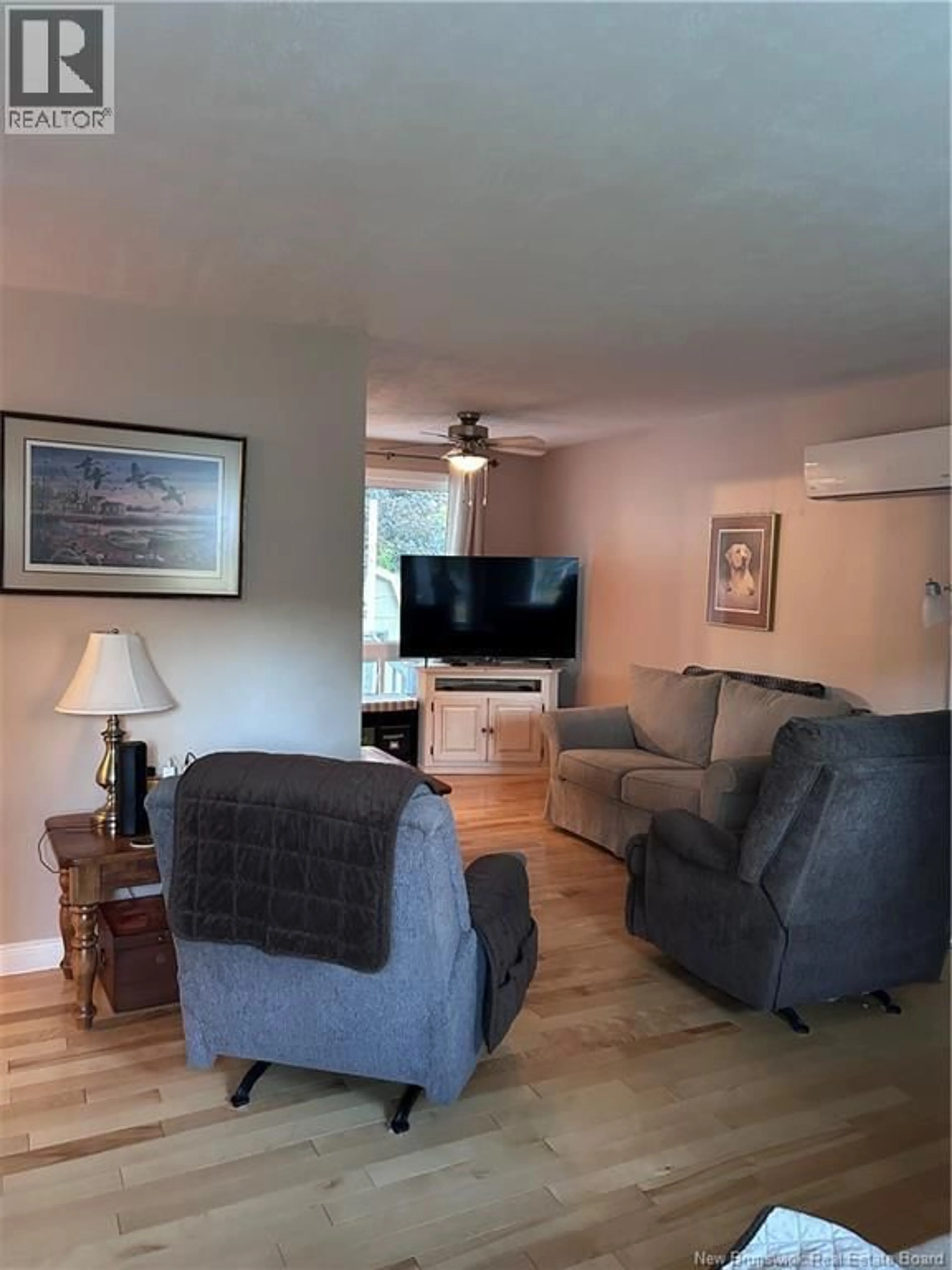 Living room with furniture, wood/laminate floor for 430 GARDINER STREET, Oromocto New Brunswick E2V1G3