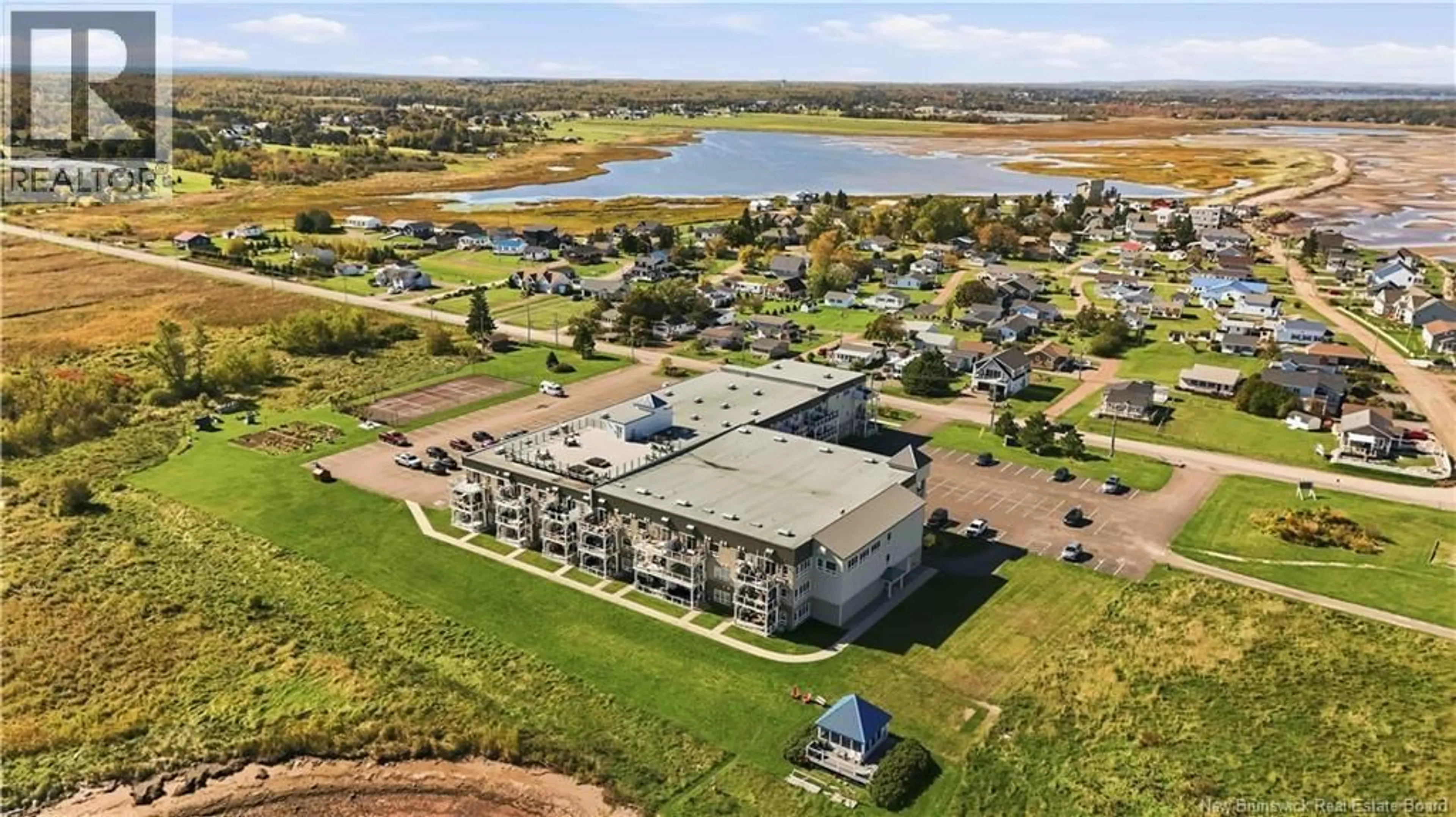 A pic from outside/outdoor area/front of a property/back of a property/a pic from drone, water/lake/river/ocean view for 217 - 69 CAP BIMET BOULEVARD, Grand-Barachois New Brunswick E4P6X5