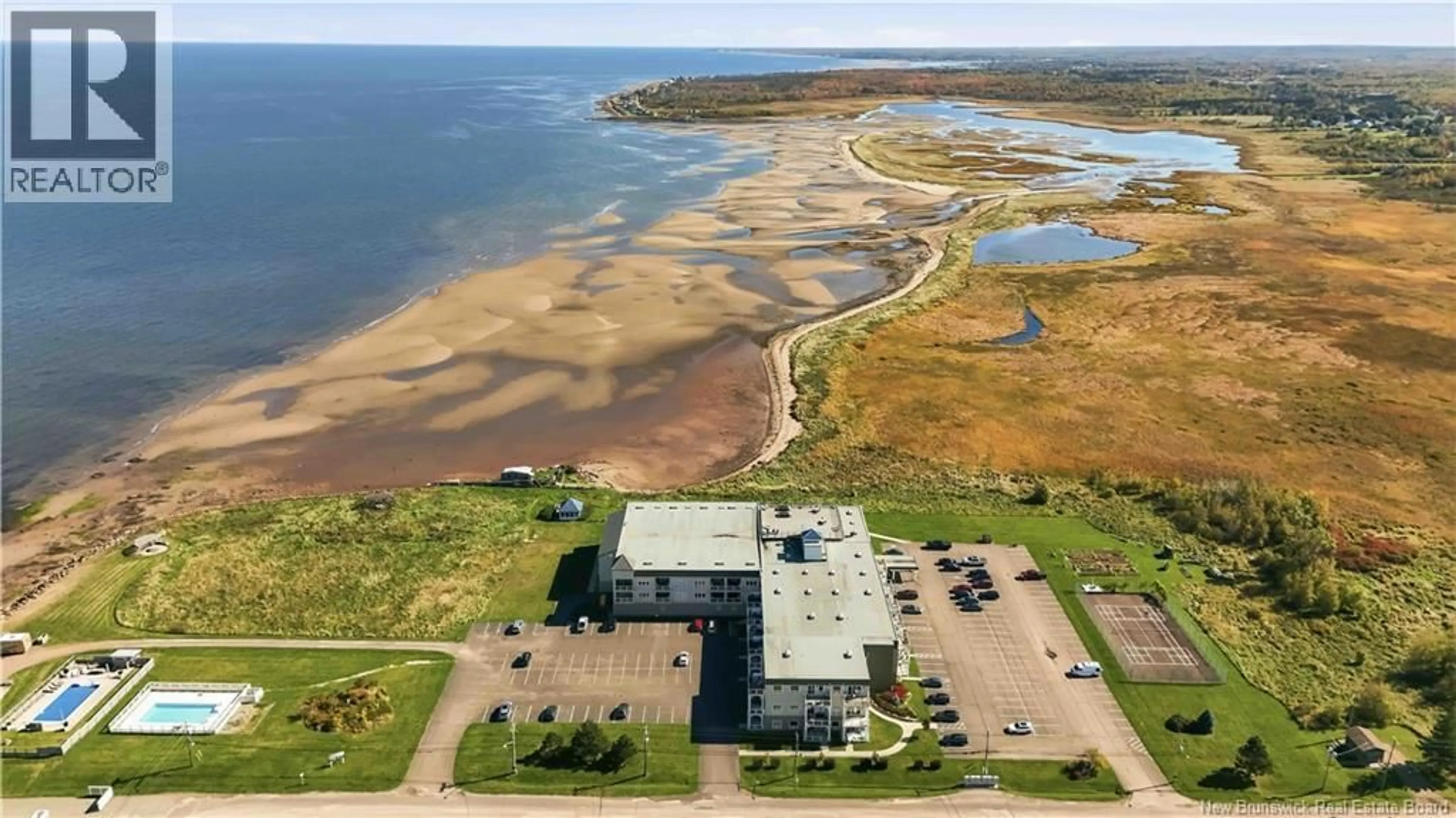 A pic from outside/outdoor area/front of a property/back of a property/a pic from drone, water/lake/river/ocean view for 316 - 69 CAP BIMET BOULEVARD, Grand-Barachois New Brunswick E4P6X5