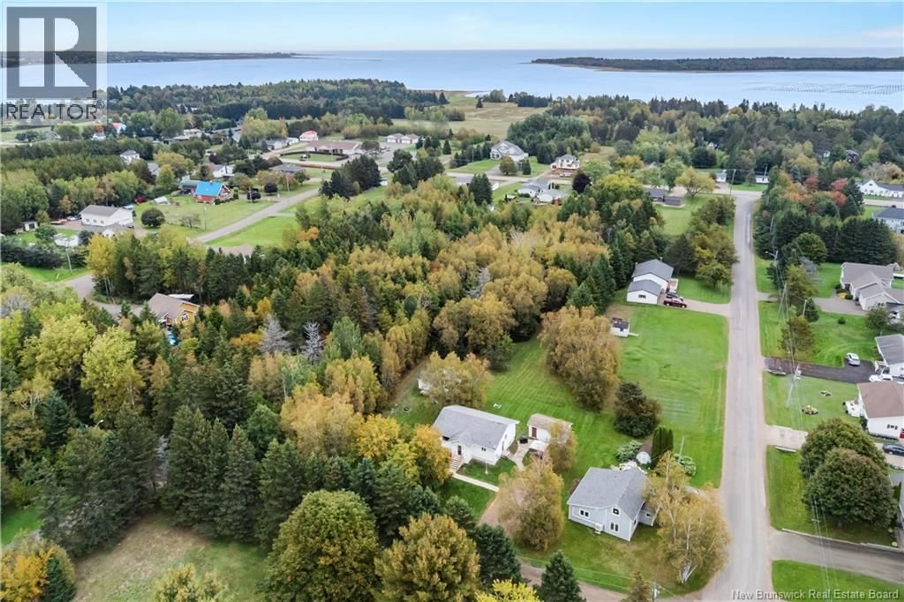 A pic from outside/outdoor area/front of a property/back of a property/a pic from drone, water/lake/river/ocean view for 3 CHEMIN GUEGUEN STREET, Shediac Bridge New Brunswick E4R1K1