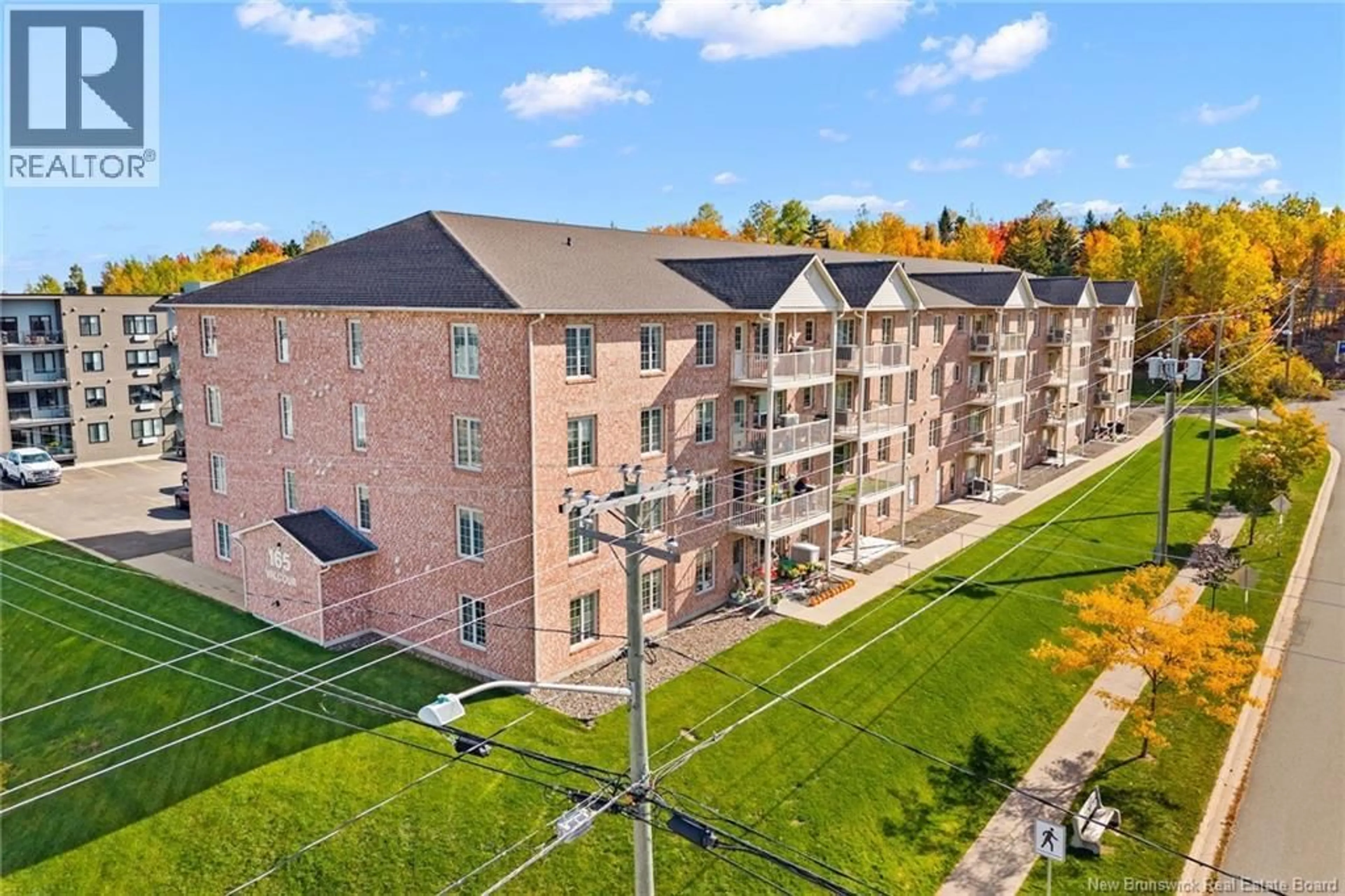 A pic from outside/outdoor area/front of a property/back of a property/a pic from drone, unknown for 212 - 165 VALCOUR DRIVE, Fredericton New Brunswick E3C0H5